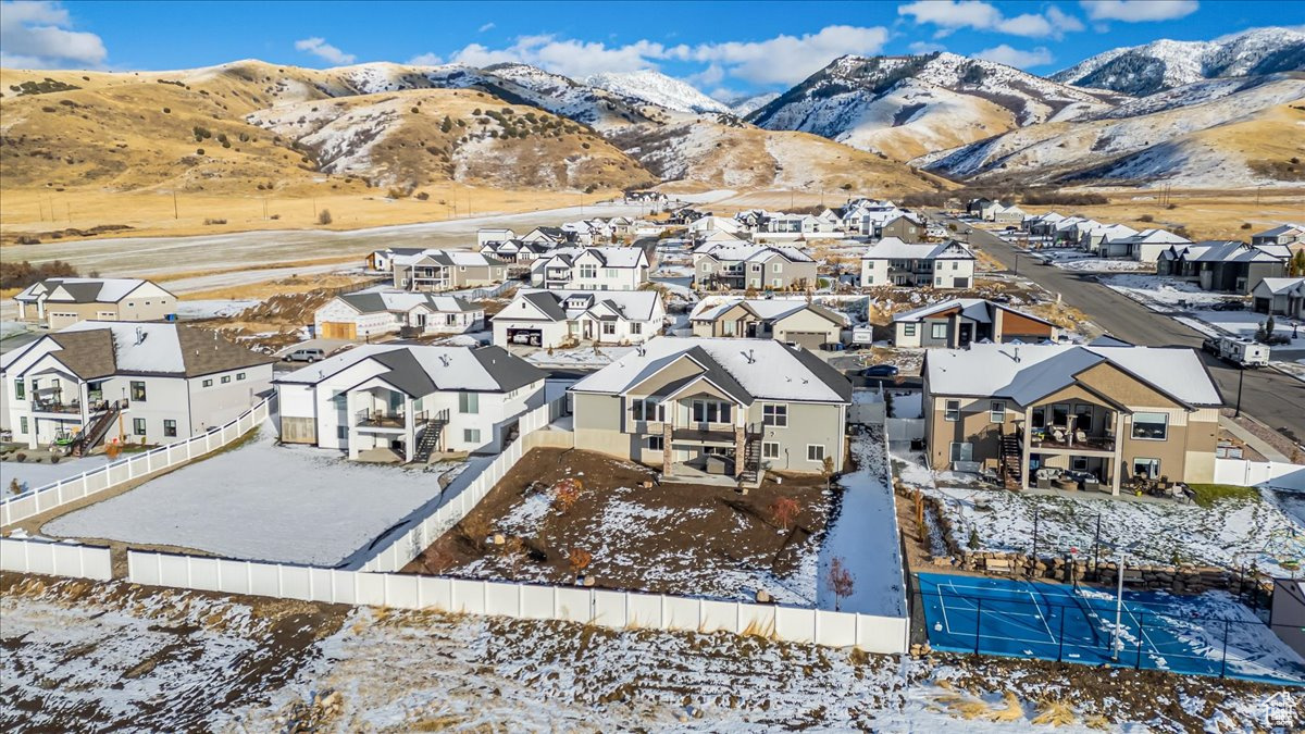 Snowy aerial view with a mountain view