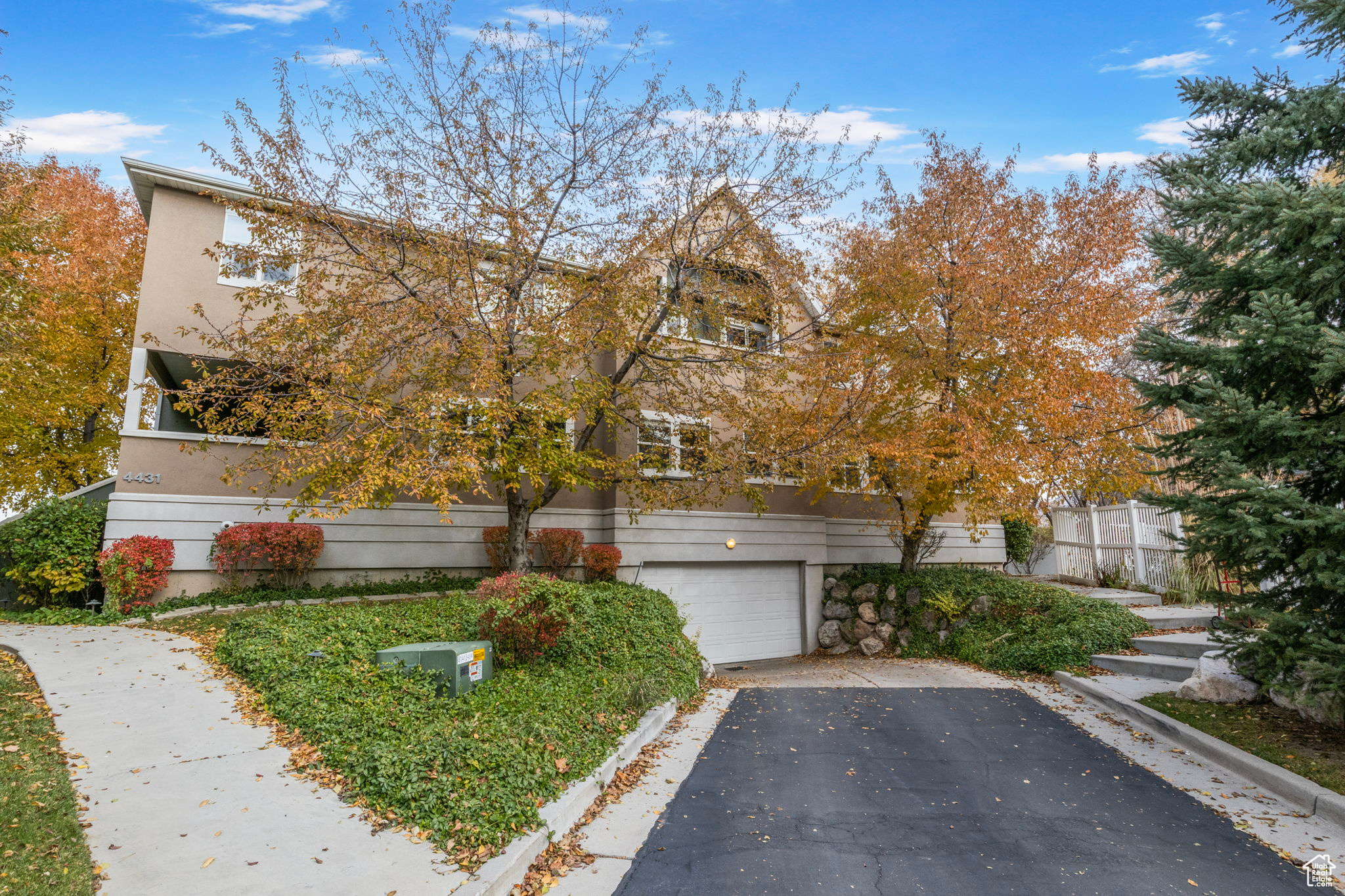 View of front of property with a garage