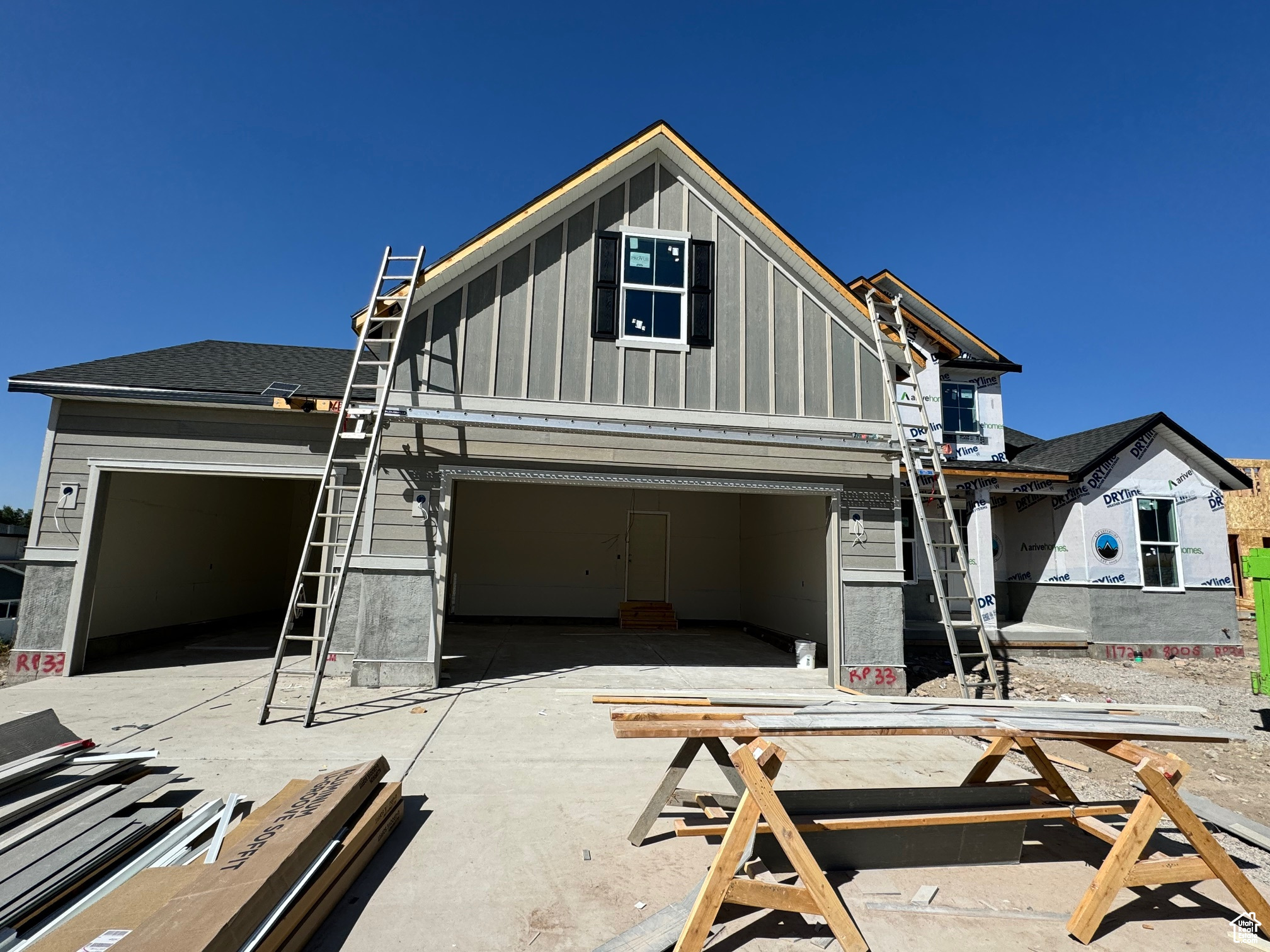 View of front of property with a garage