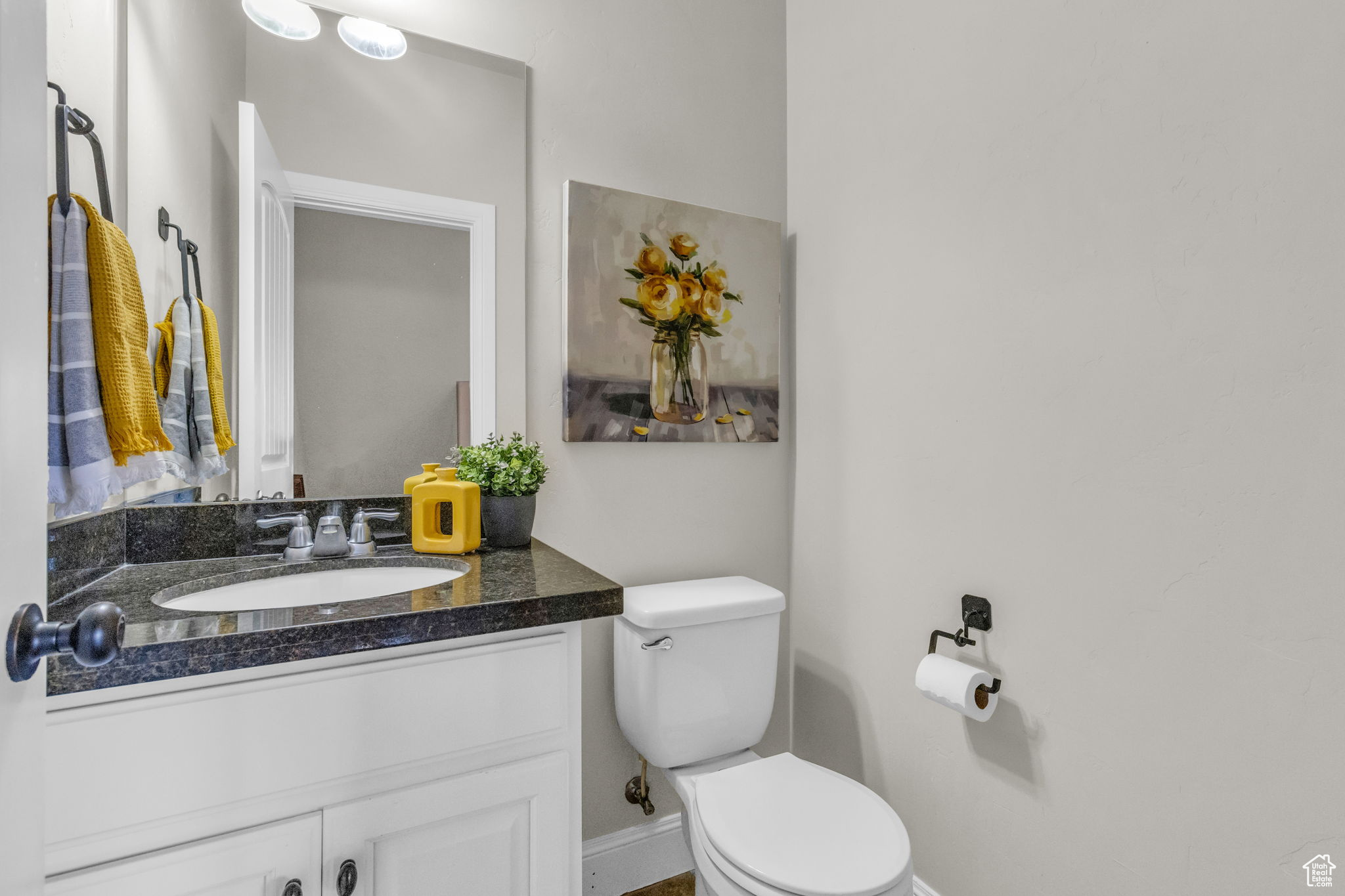 Bathroom with vanity and toilet