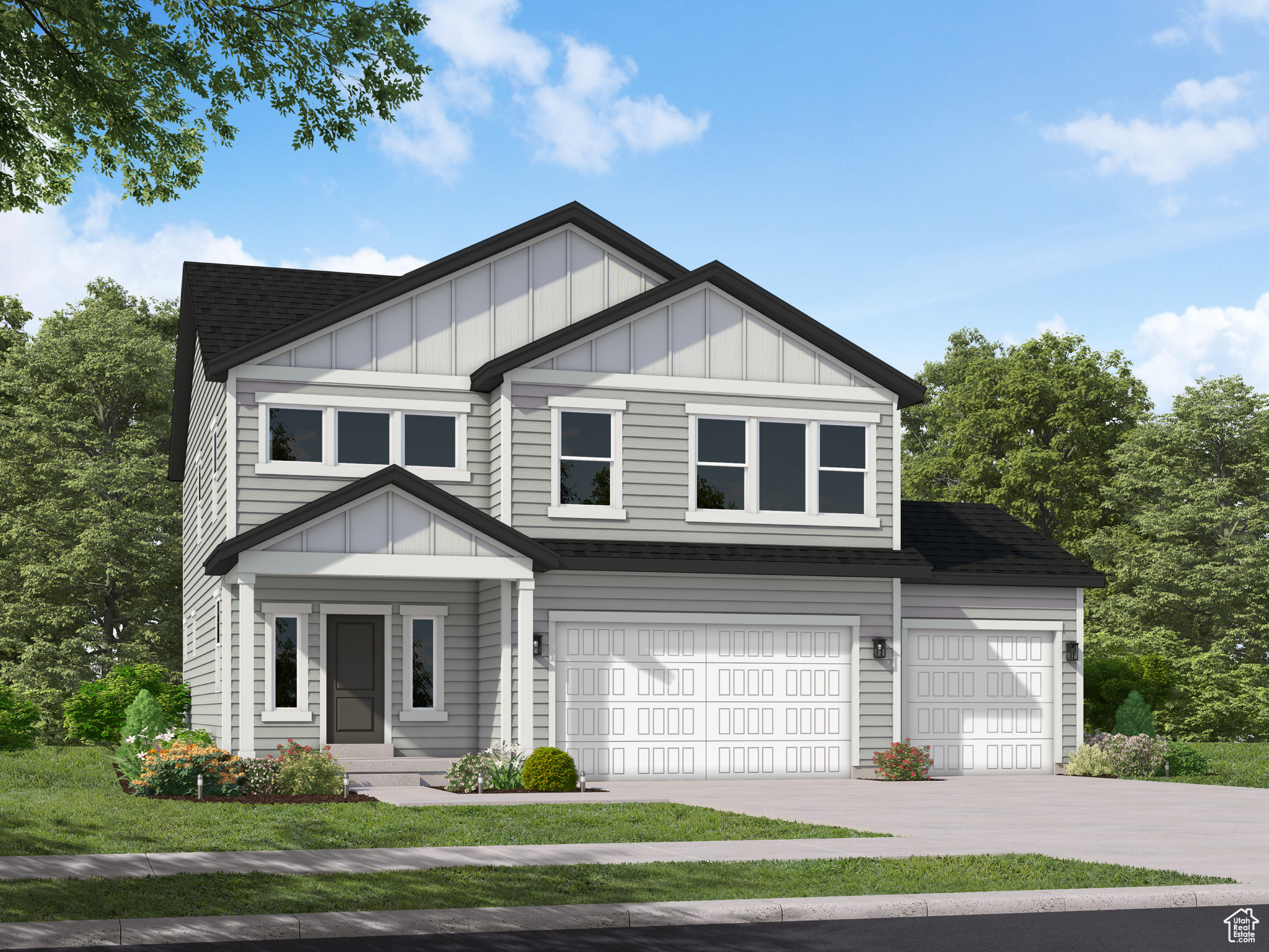 View of front of home featuring a 3-bay garage