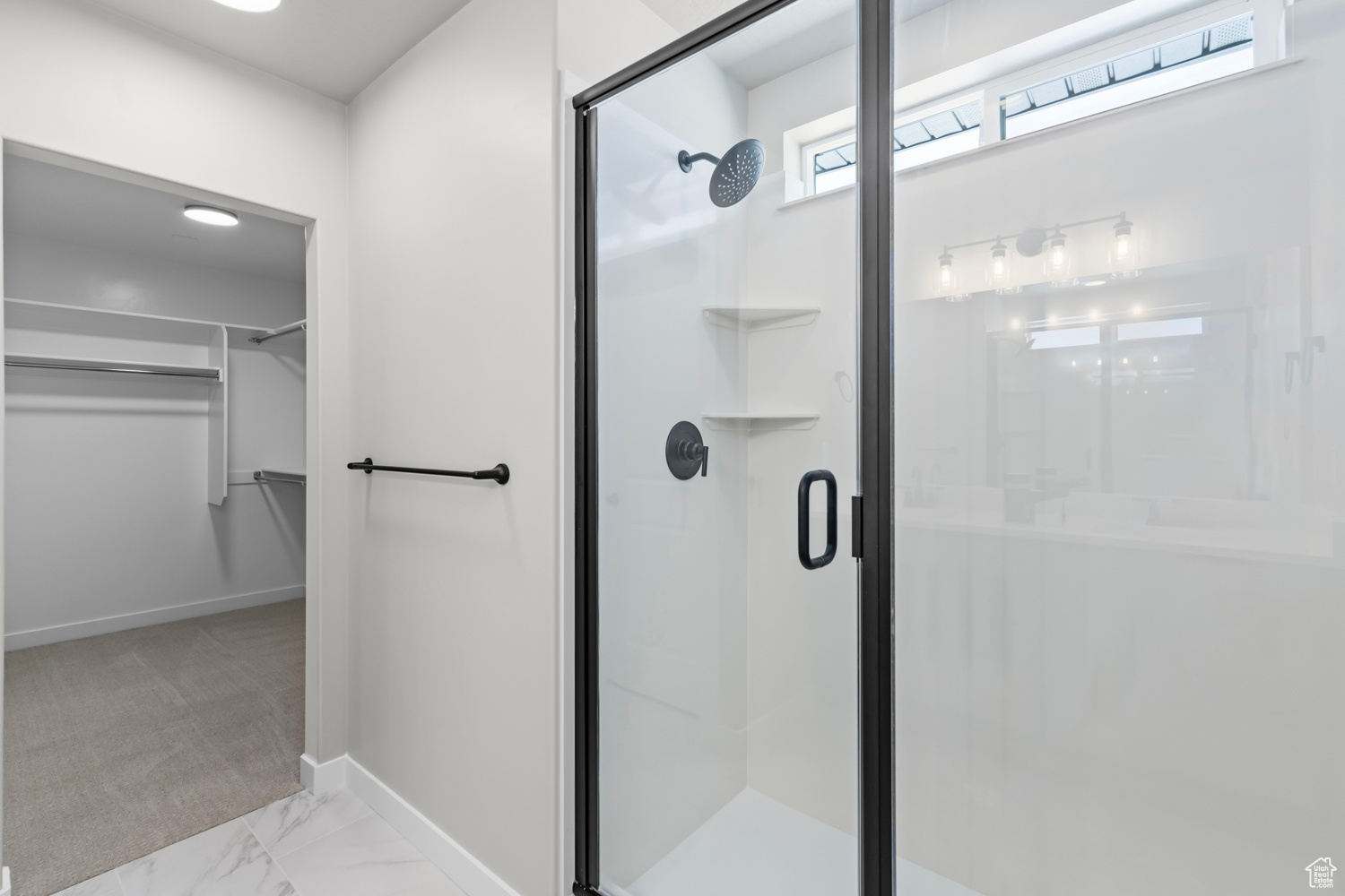 Bathroom featuring an enclosed shower