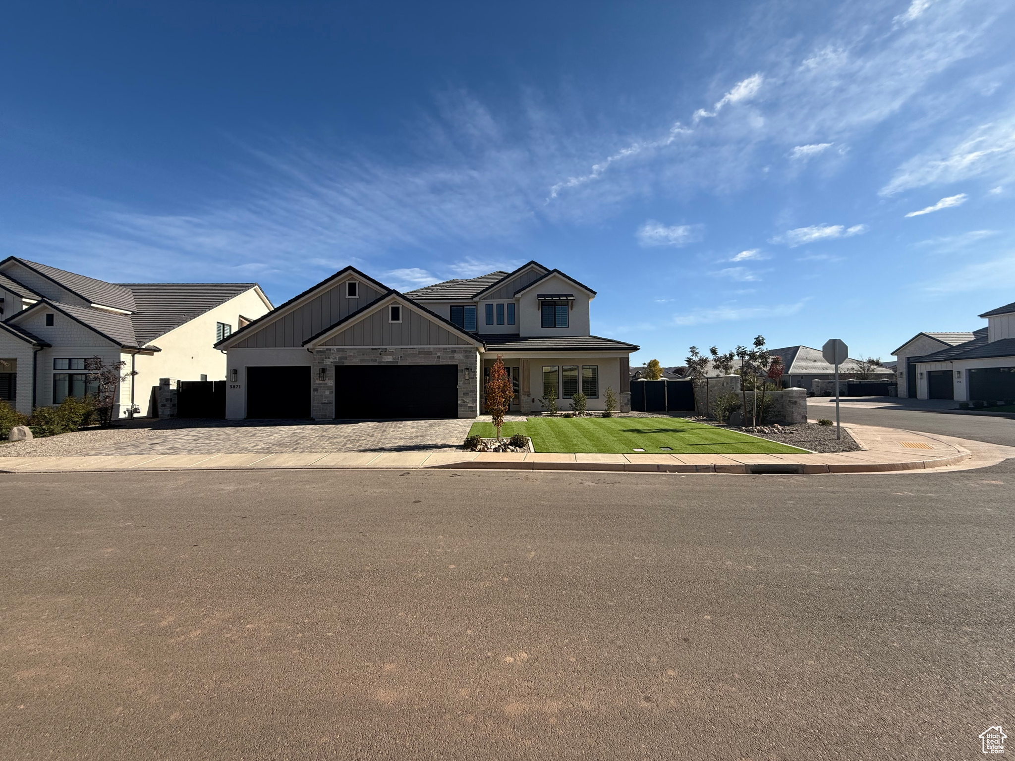 View of front facade featuring a garage