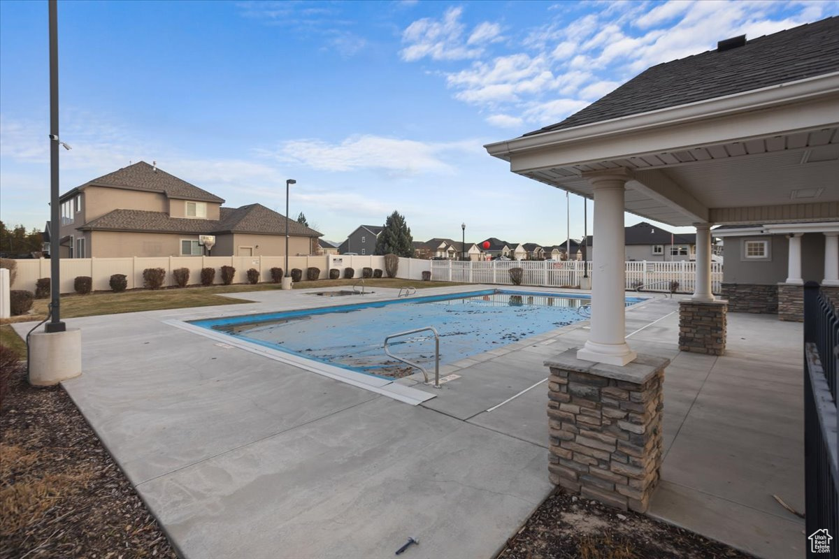 View of swimming pool with a patio area