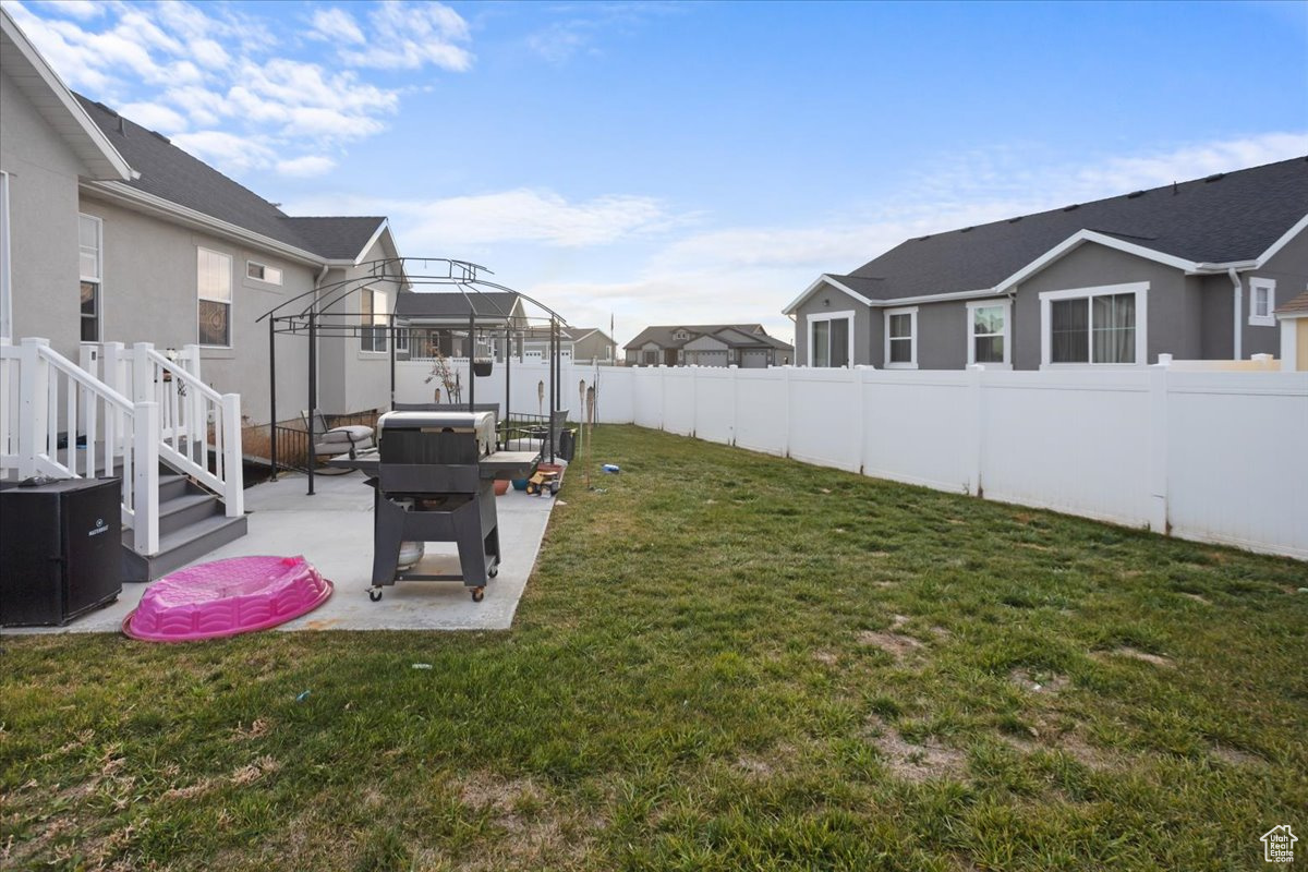 View of yard featuring a patio