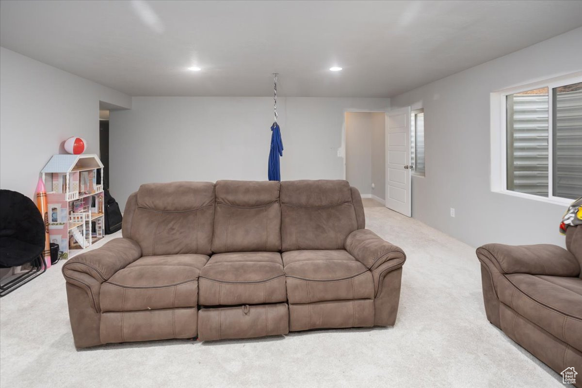 Living room with light colored carpet