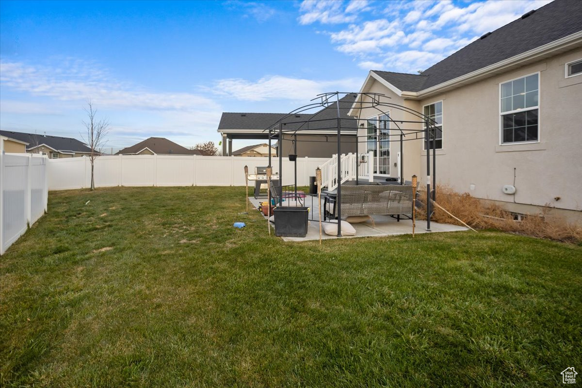 View of yard featuring an outdoor living space and a patio area