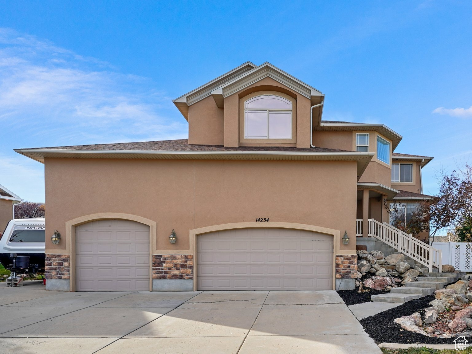 View of front of property with a garage