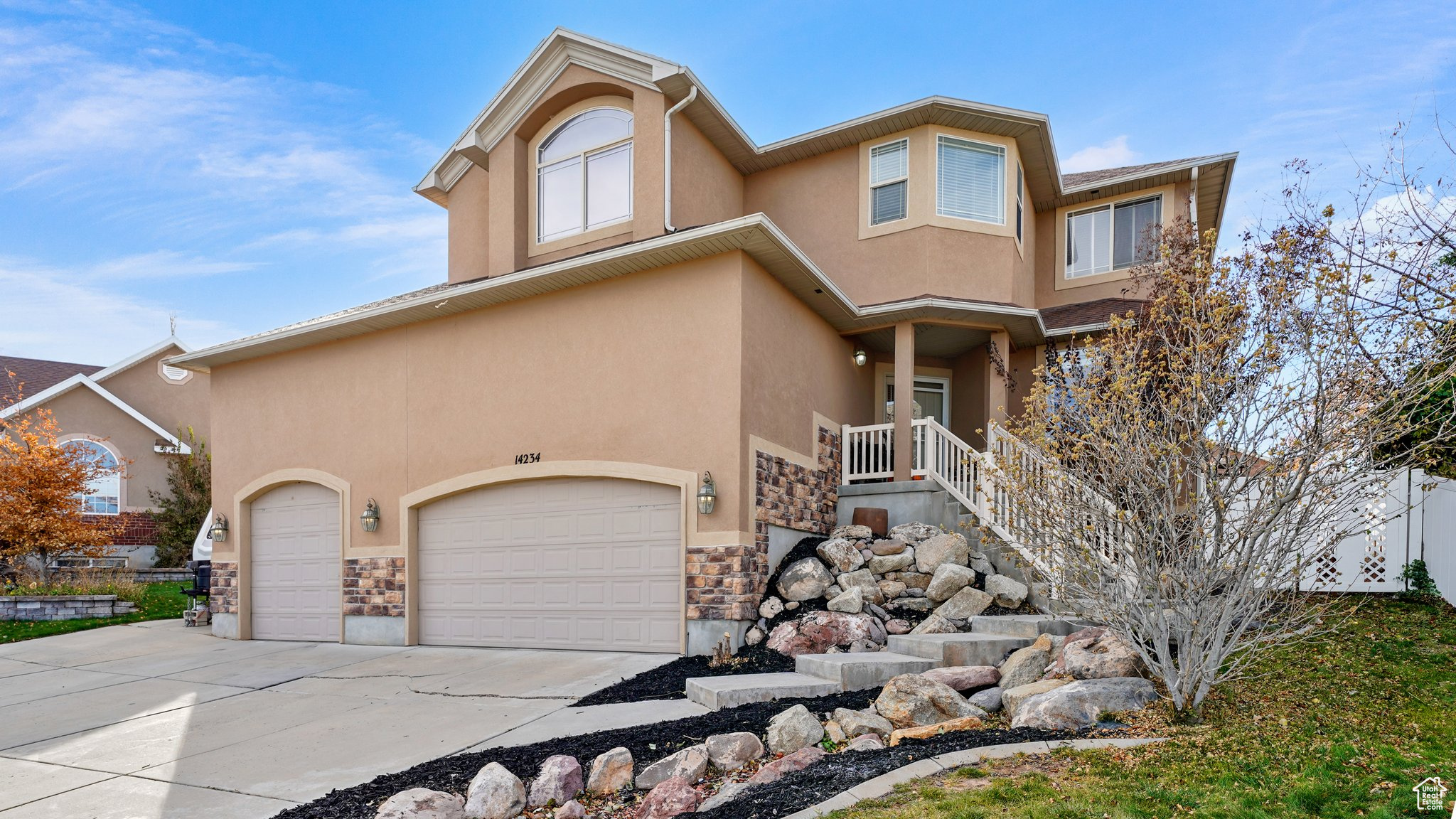 View of front of home featuring a garage