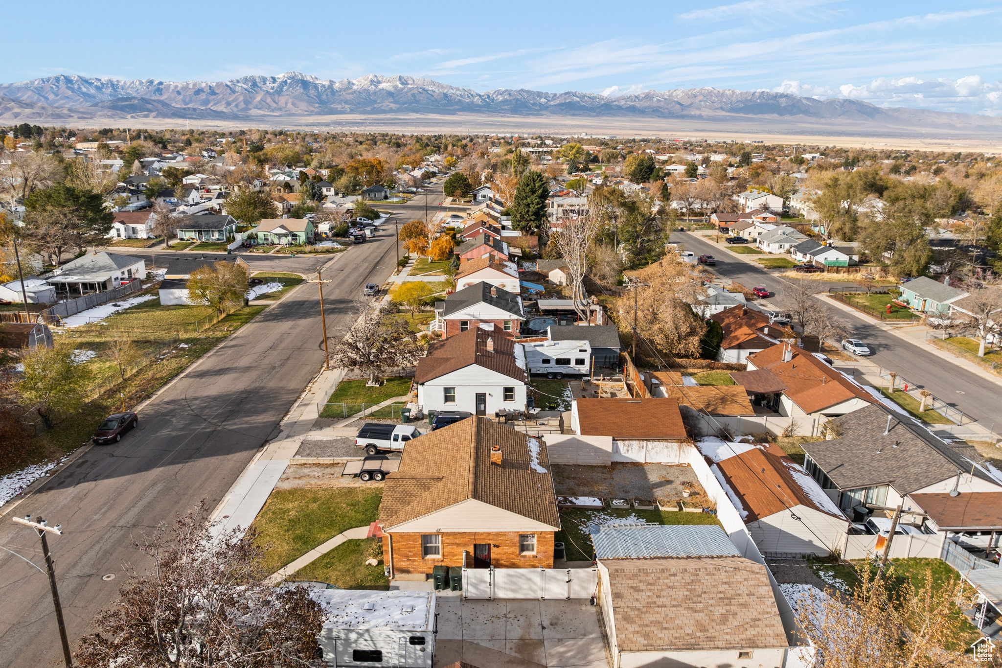 Birds eye view of property with a mountain view