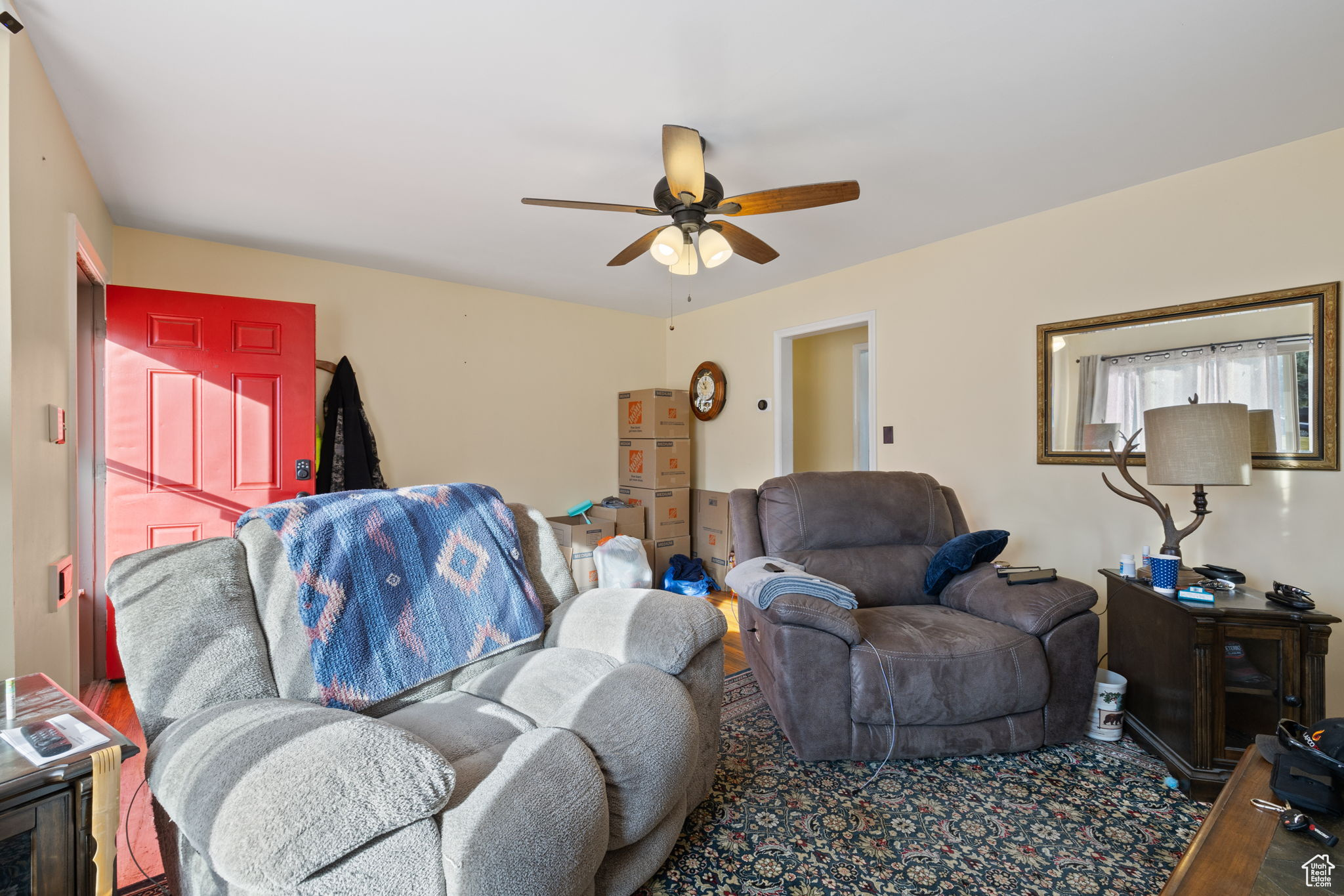 Living room featuring ceiling fan
