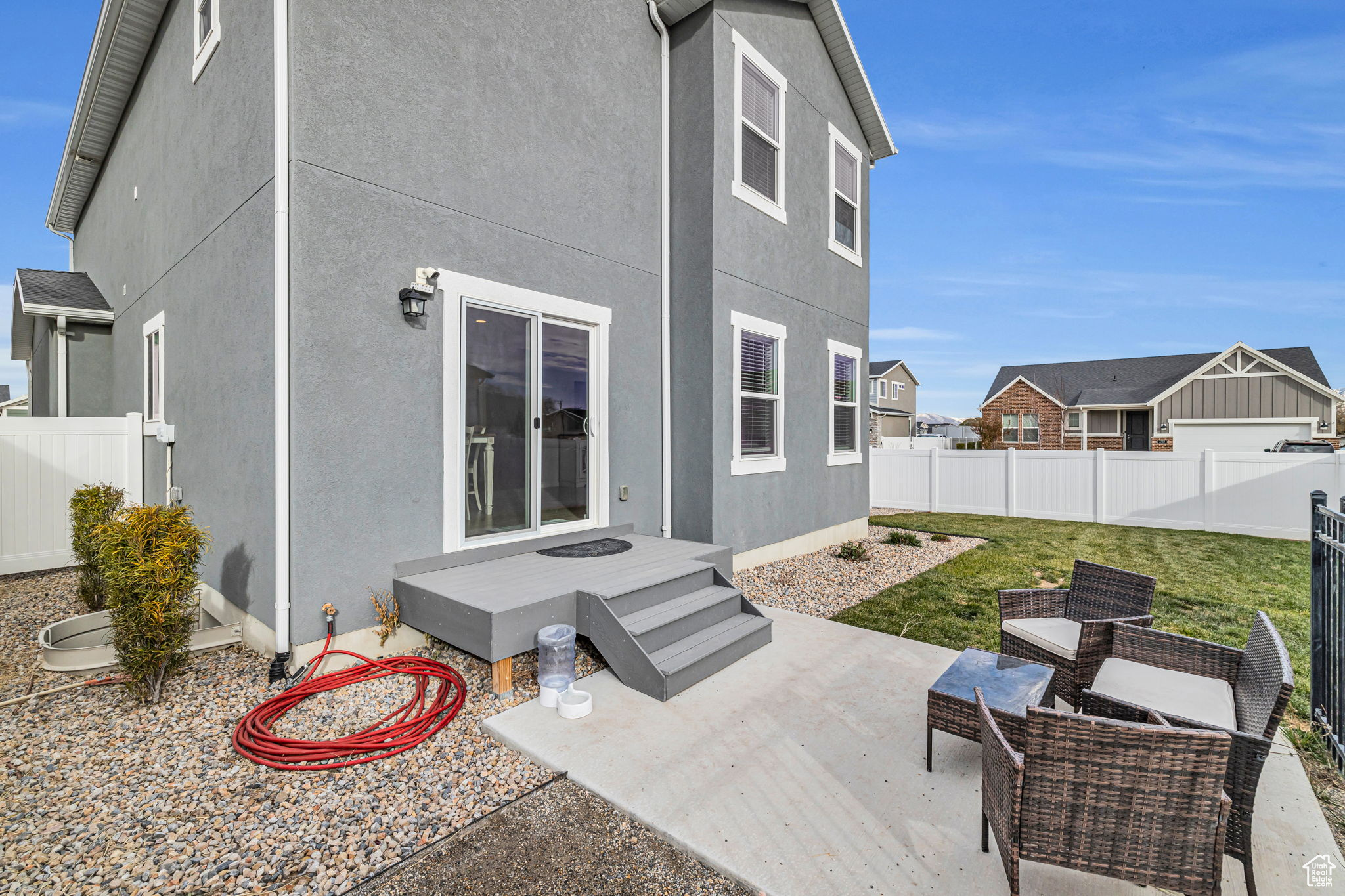 Rear view of house with a patio area