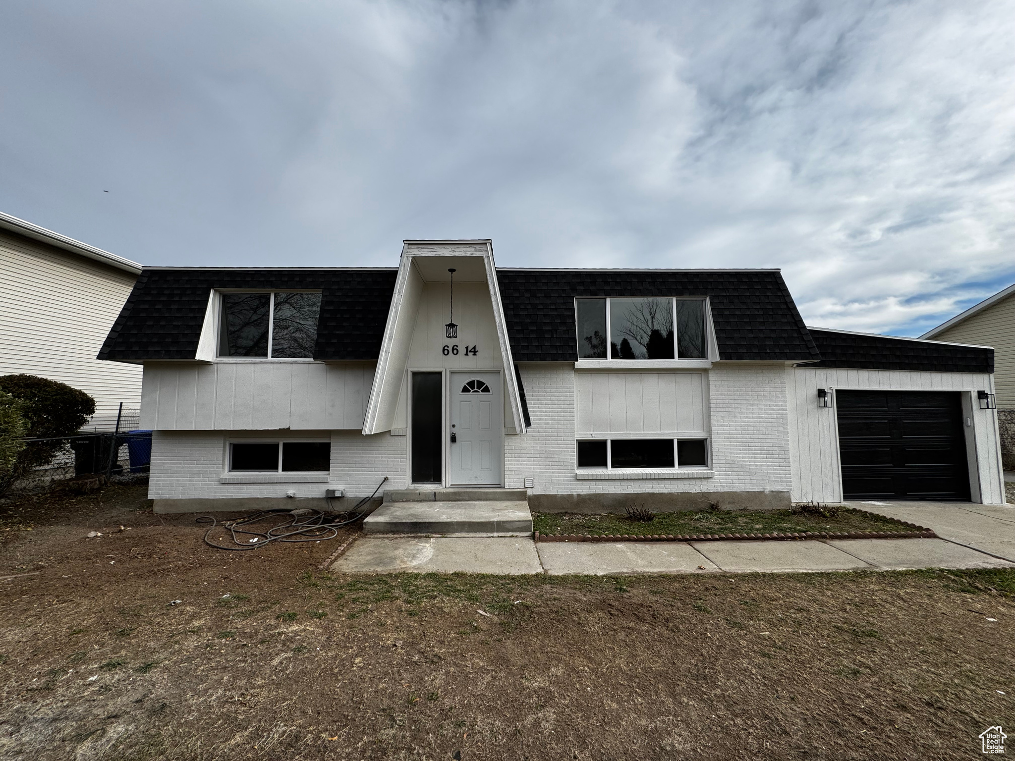 View of front of home featuring a garage