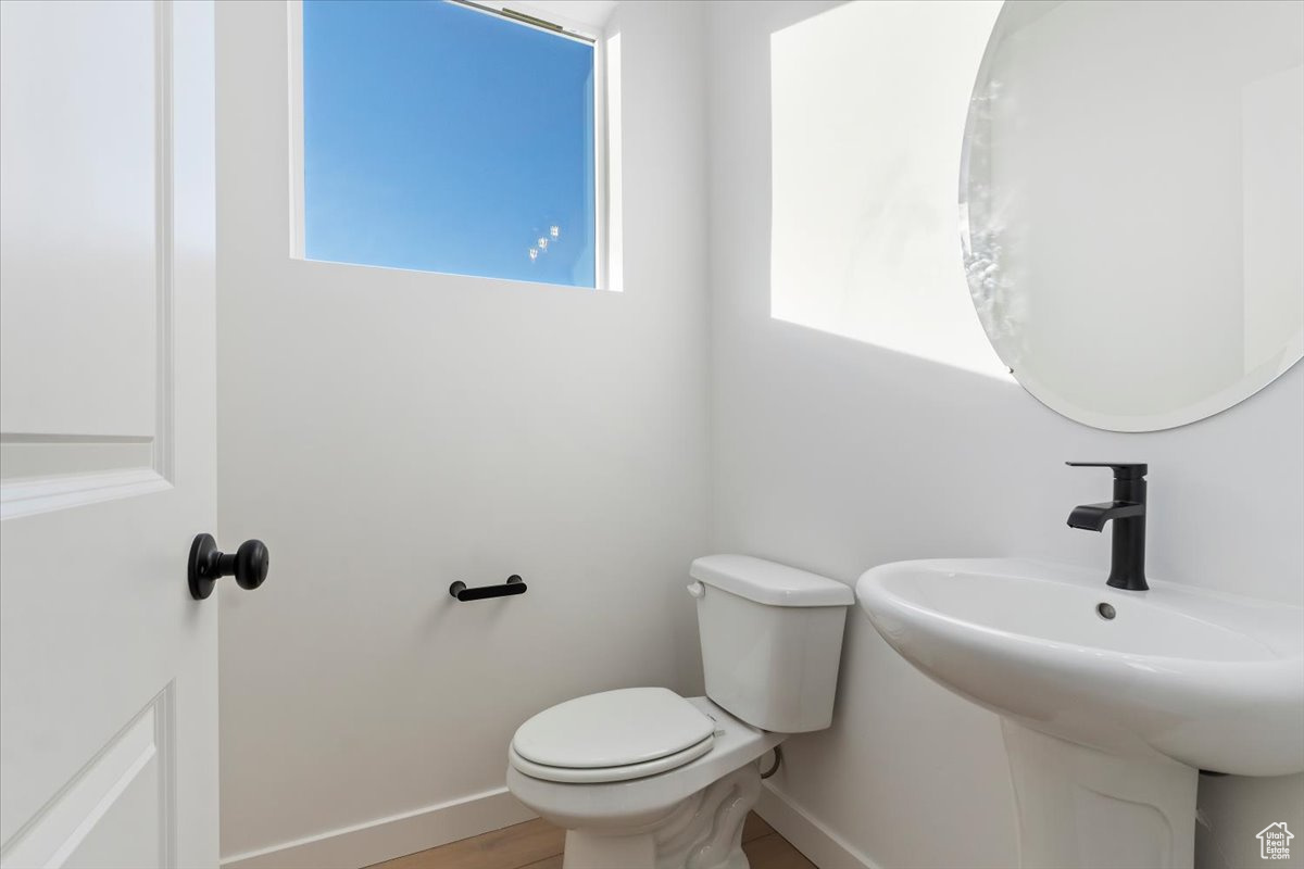 Bathroom with sink and toilet