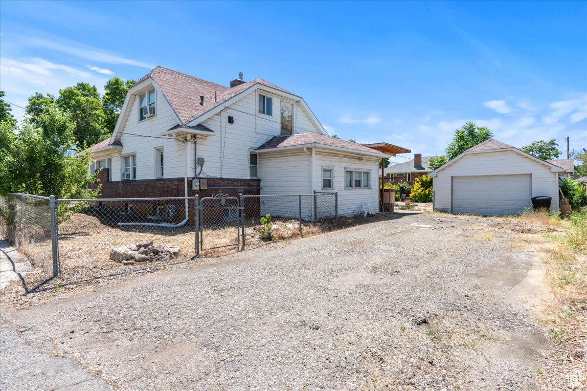 View behind house of driveway