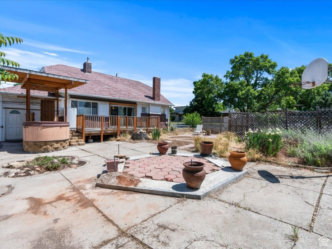 View of terrace featuring a deck