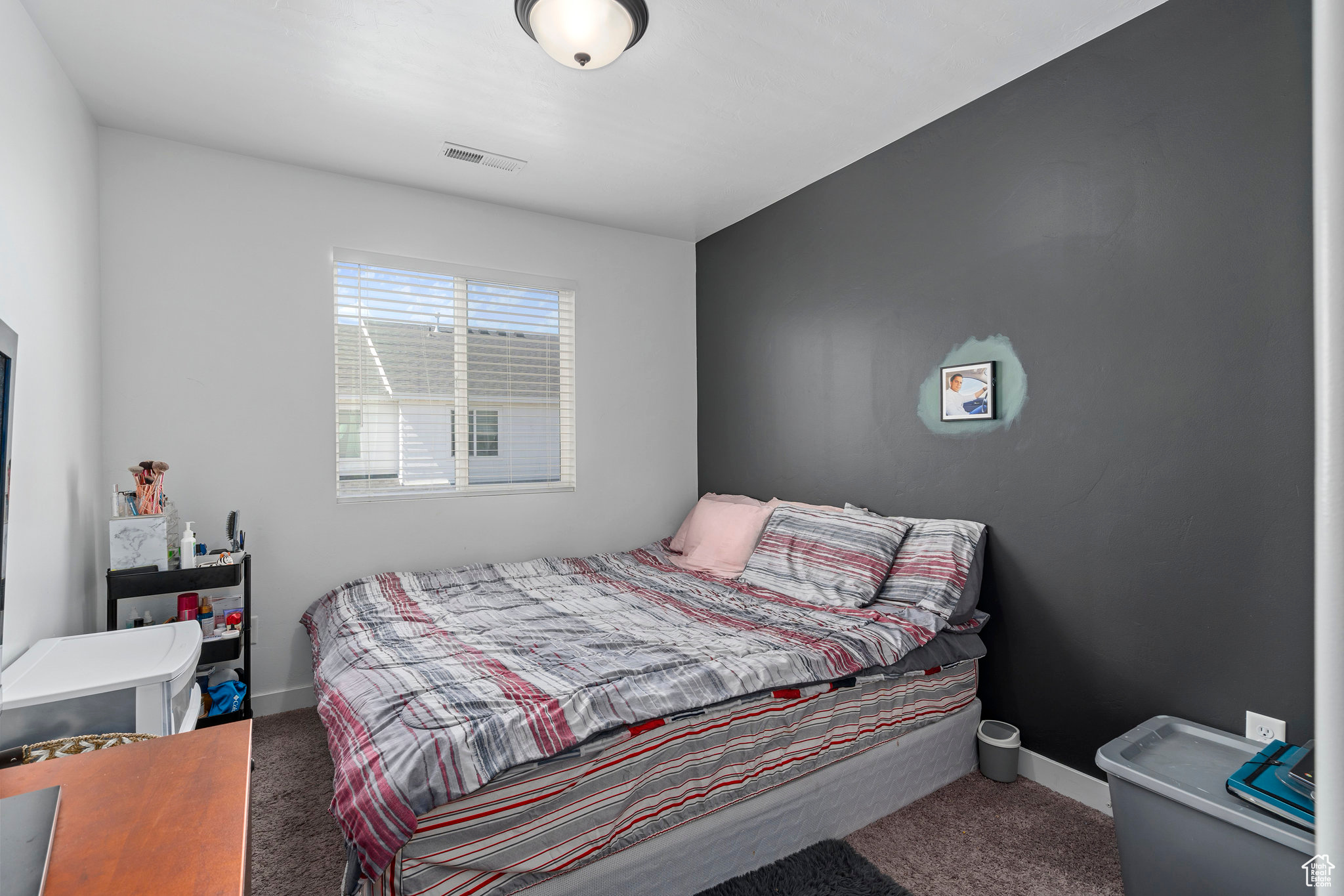 Bedroom featuring carpet flooring