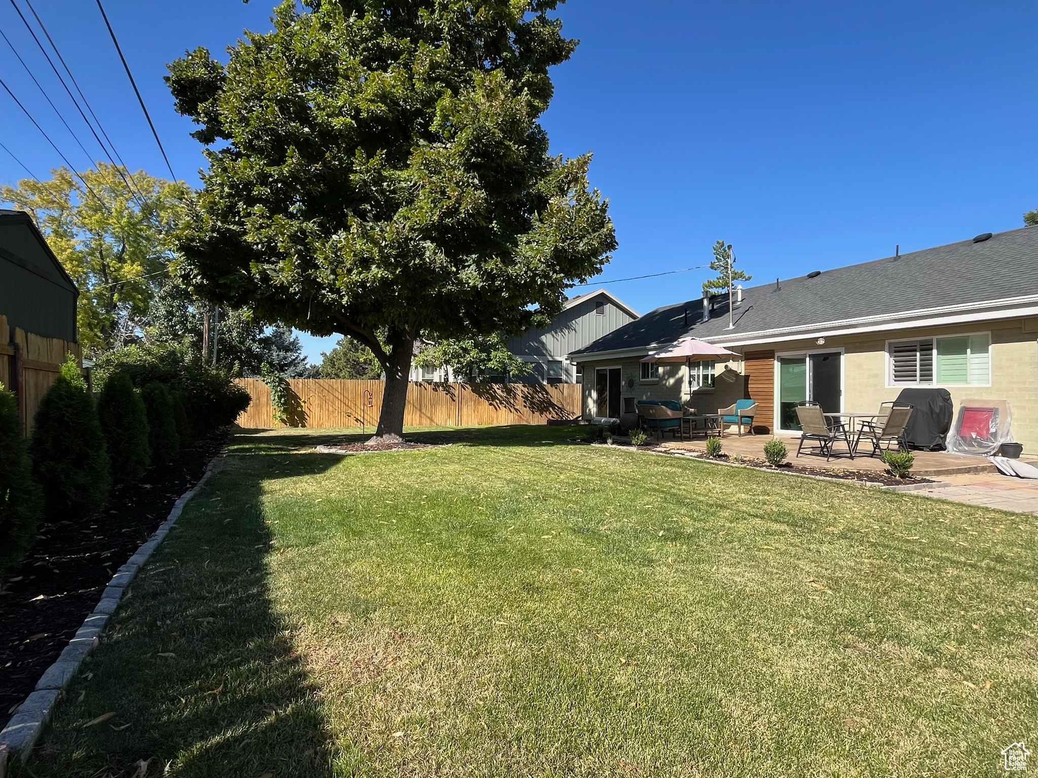 View of yard with a patio area