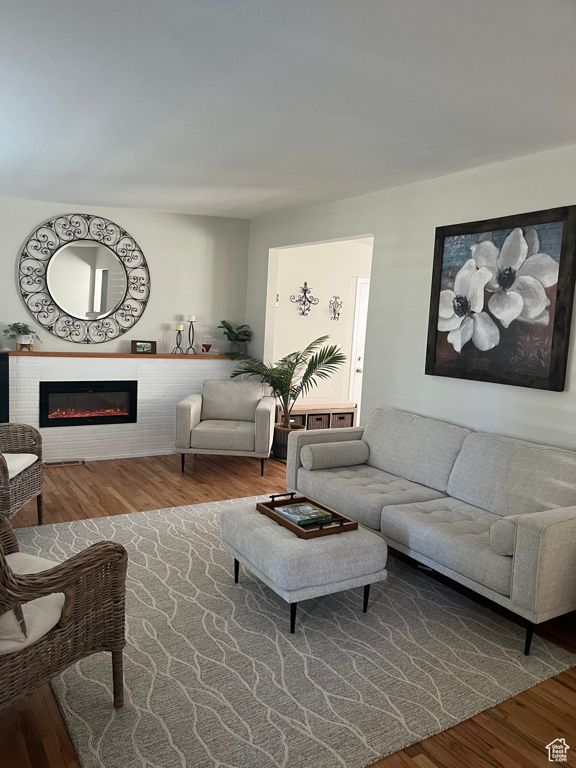 Living room with hardwood / wood-style flooring