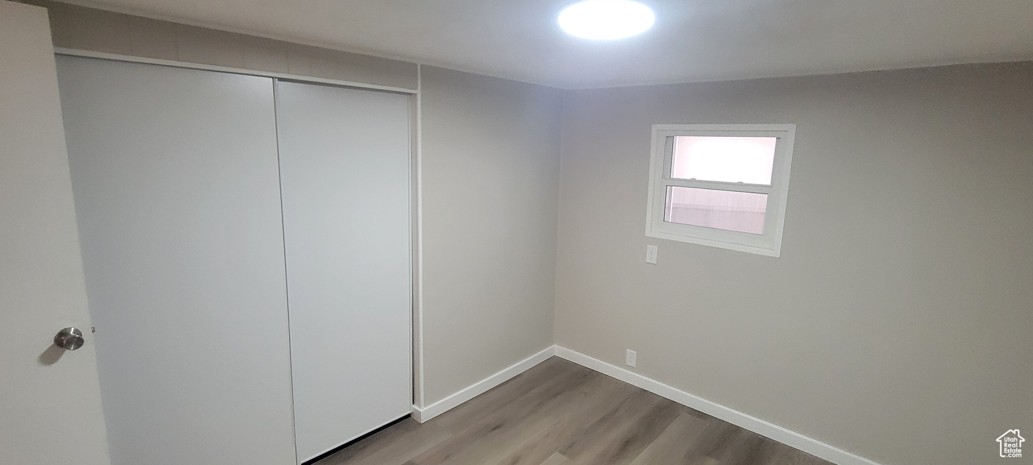 Interior space featuring light hardwood / wood-style flooring and a closet