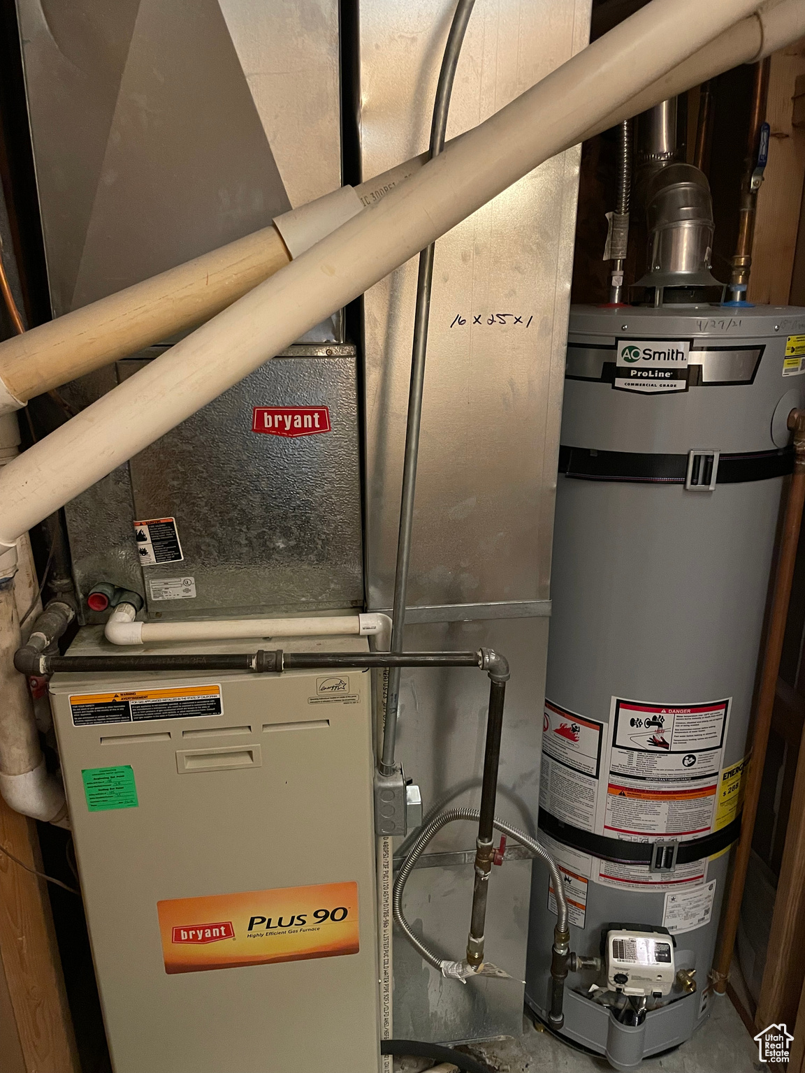 Utility room 90% Furnace and  secured water heater