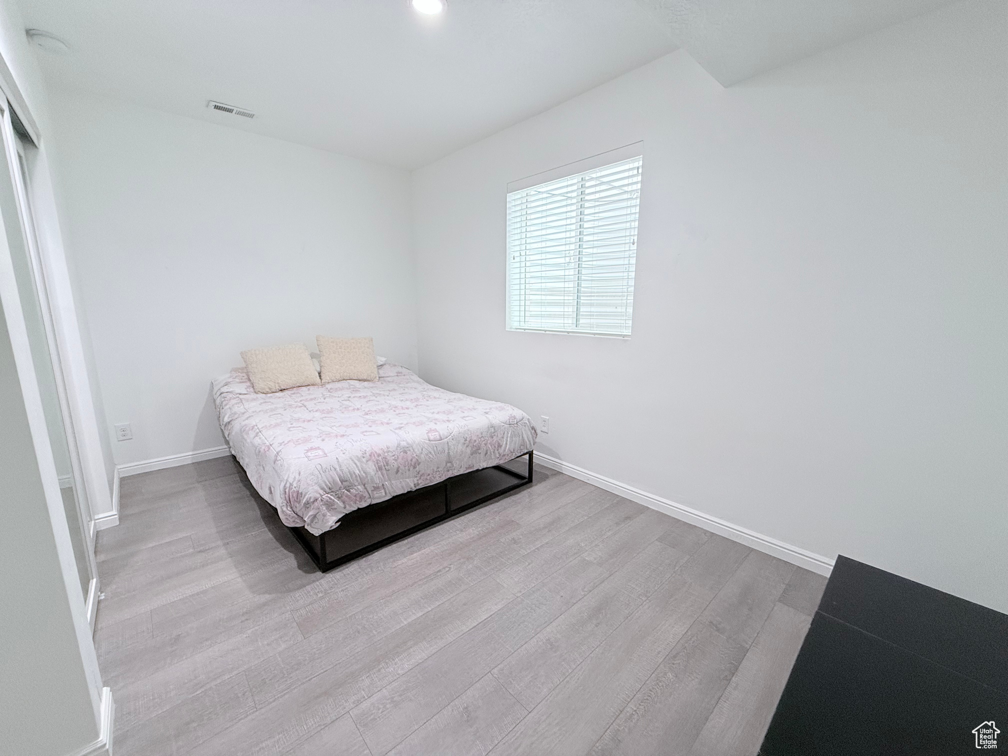 Bedroom #5 with 9' ceilings in basement