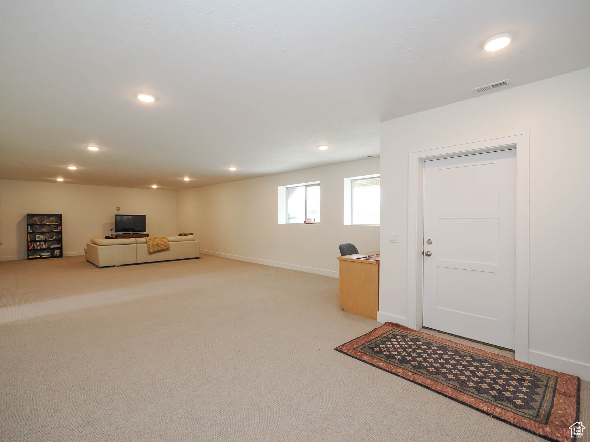 Family room with basement entrance