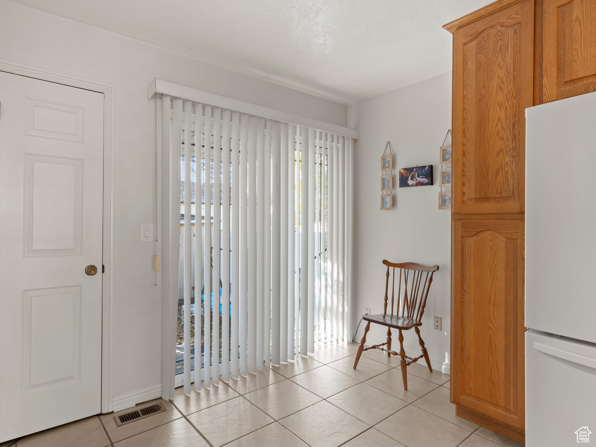 Interior space featuring light tile patterned flooring