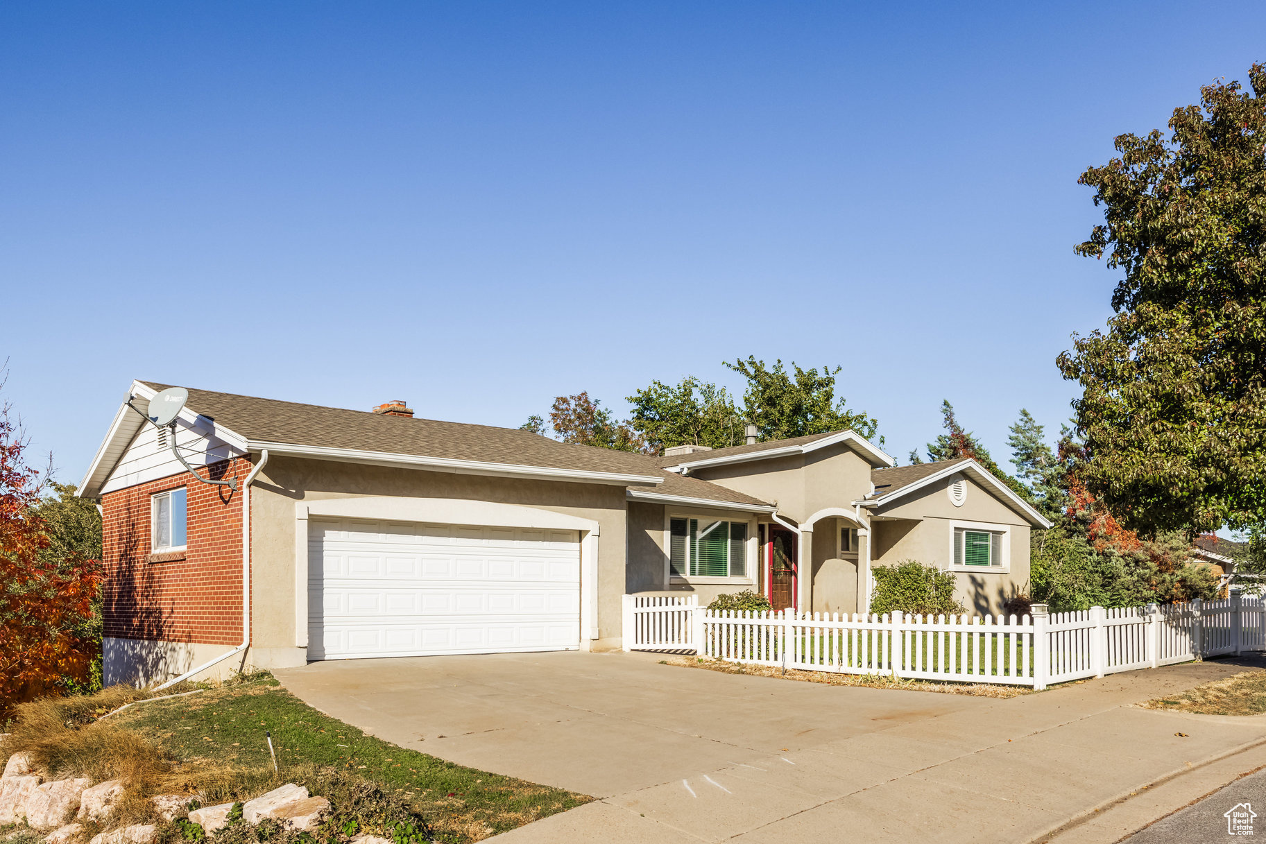 Single story home with a garage