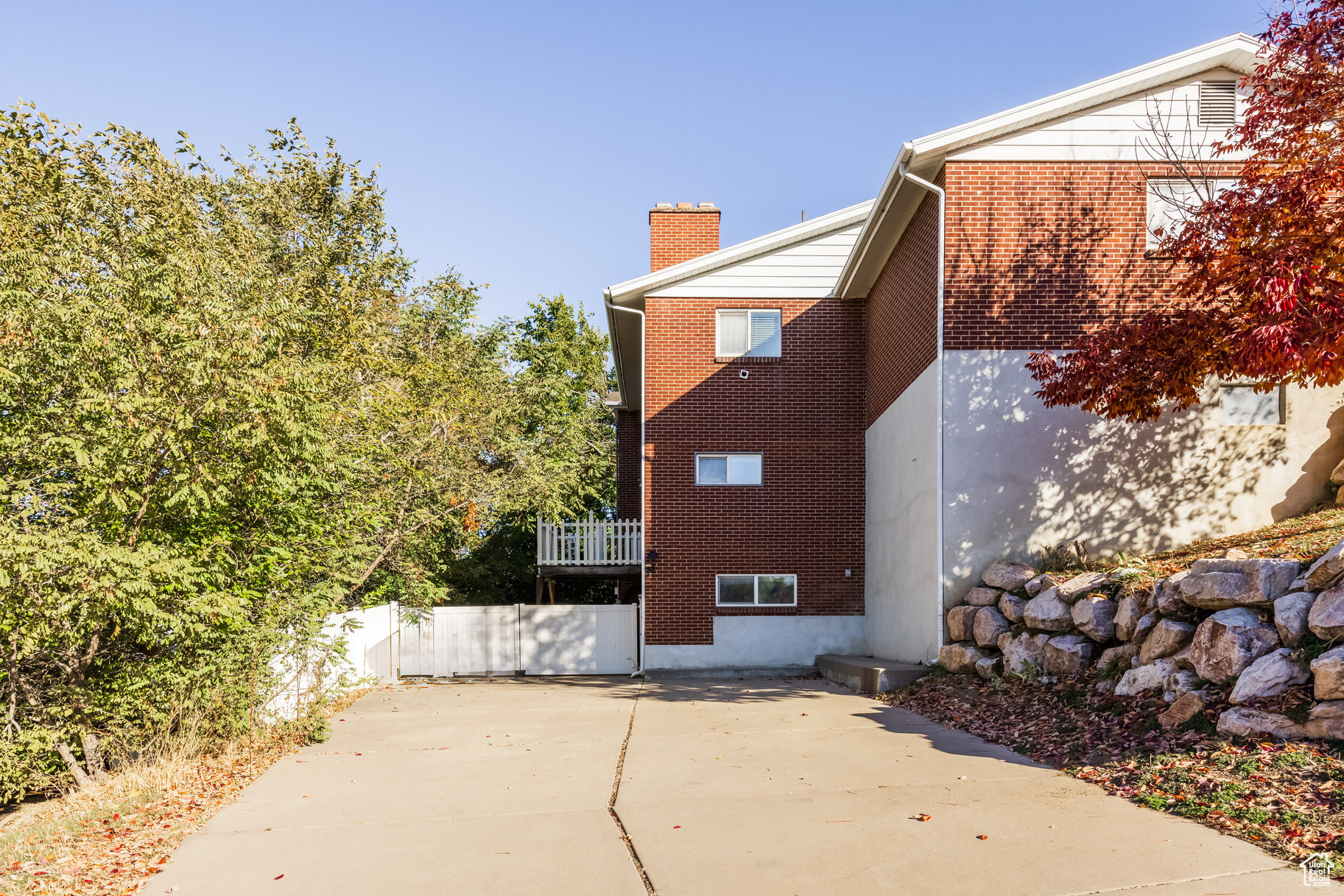 View of side of property with a patio