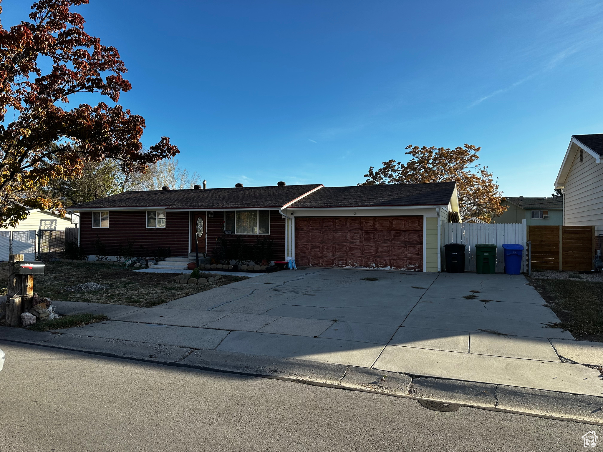 Single story home featuring a garage