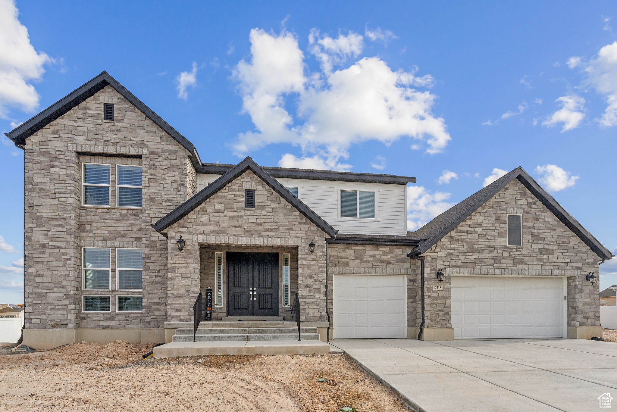 View of front of home with a garage