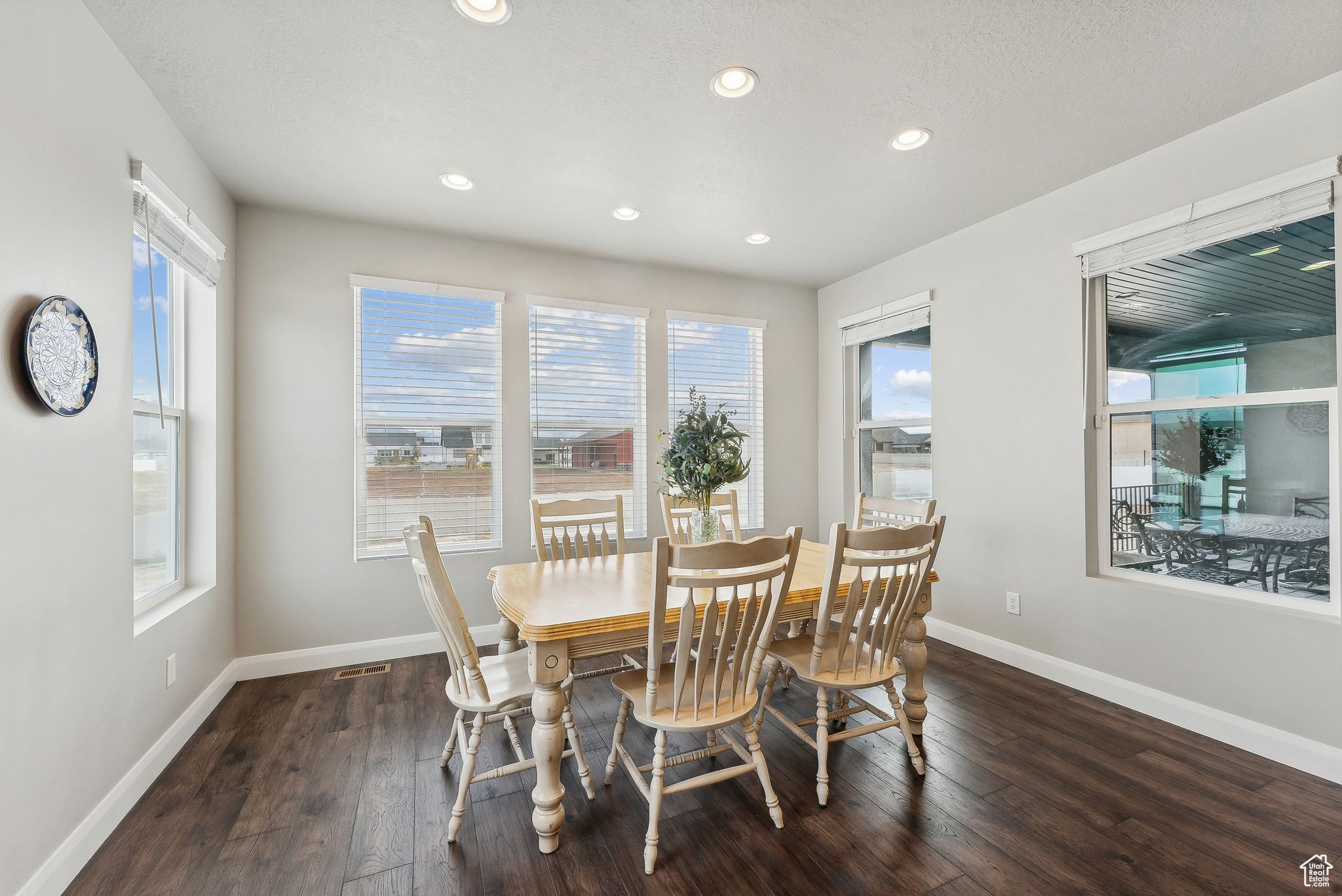 Dining space featuring dark hardwood / wood-style floors