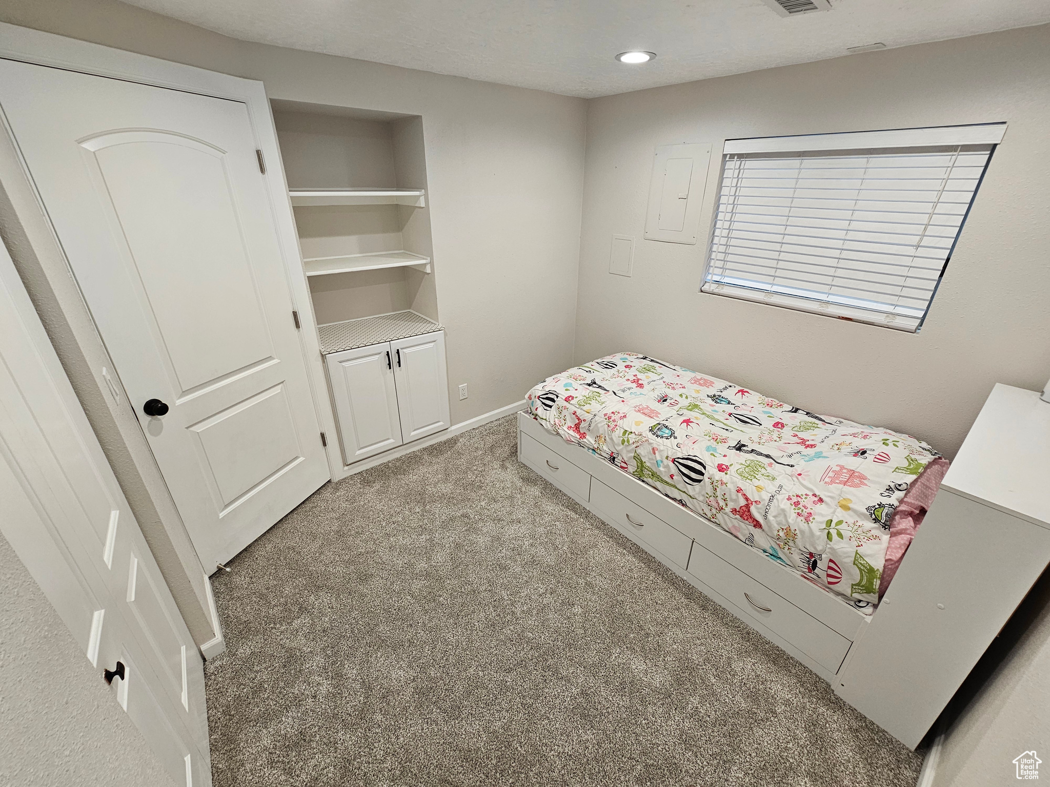 View of carpeted bedroom