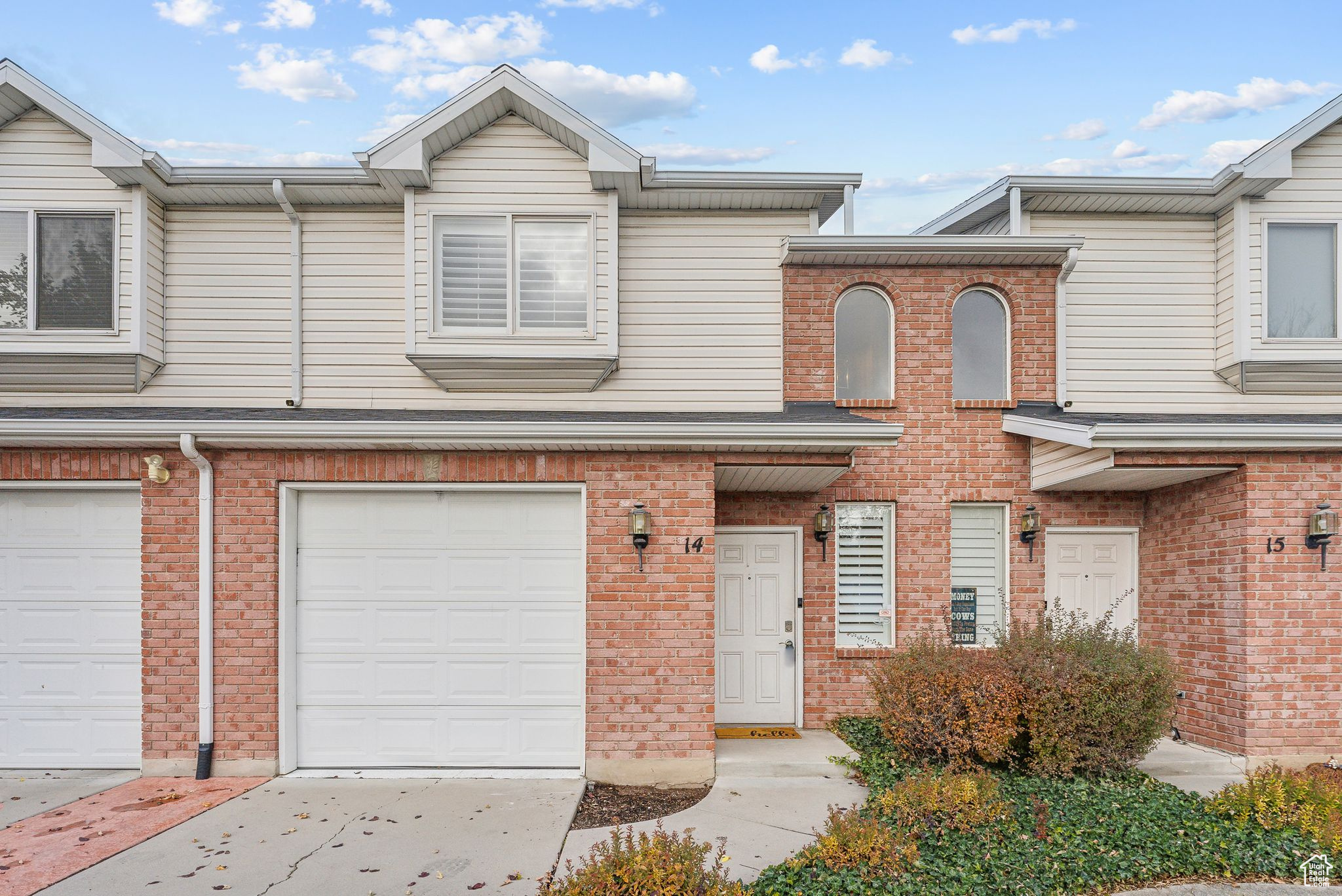 View of property with a garage