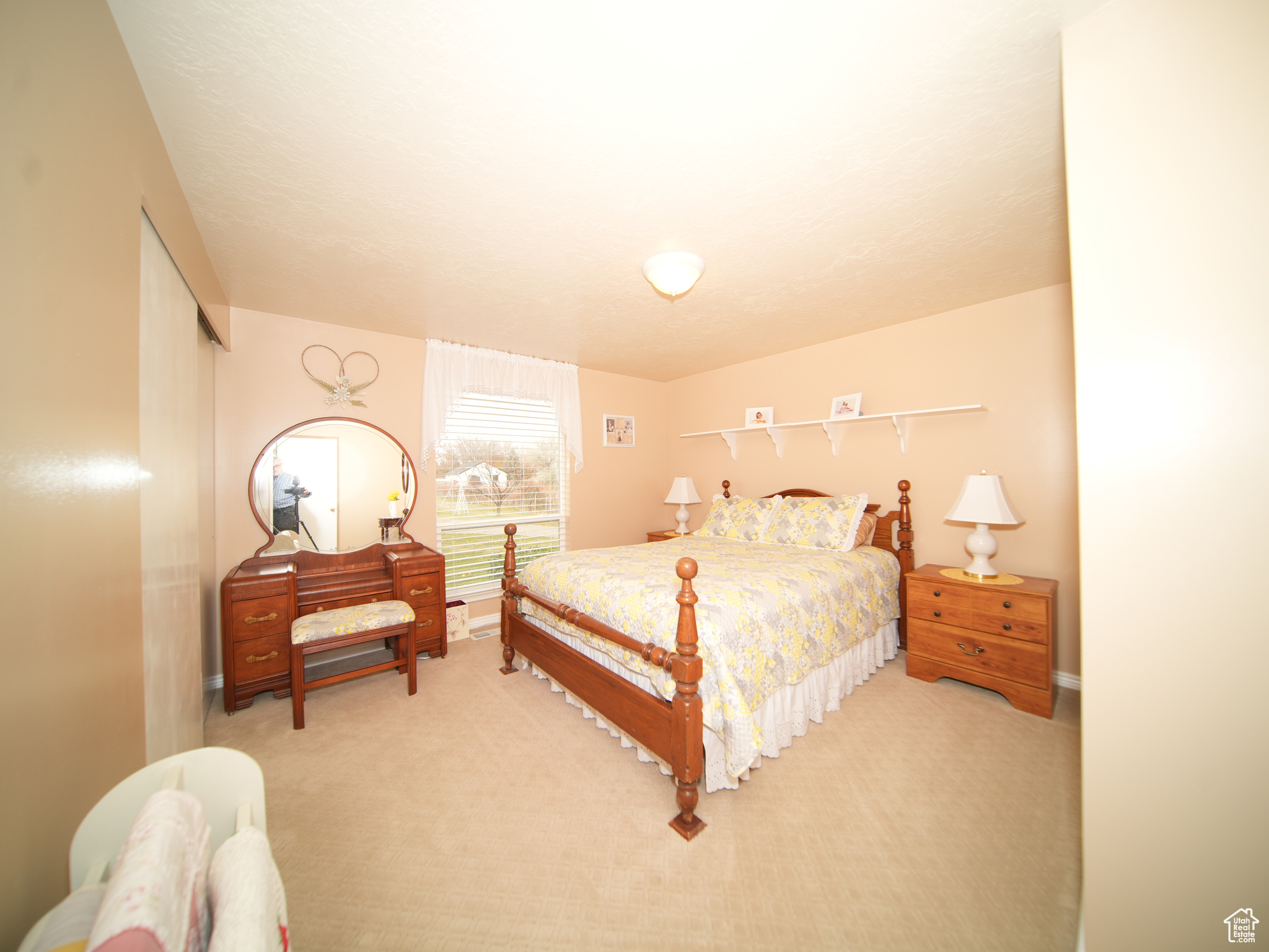 Bedroom featuring carpet floors