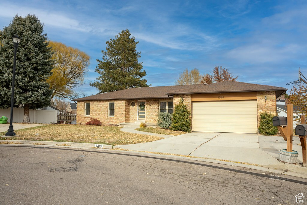 Ranch-style house with a garage