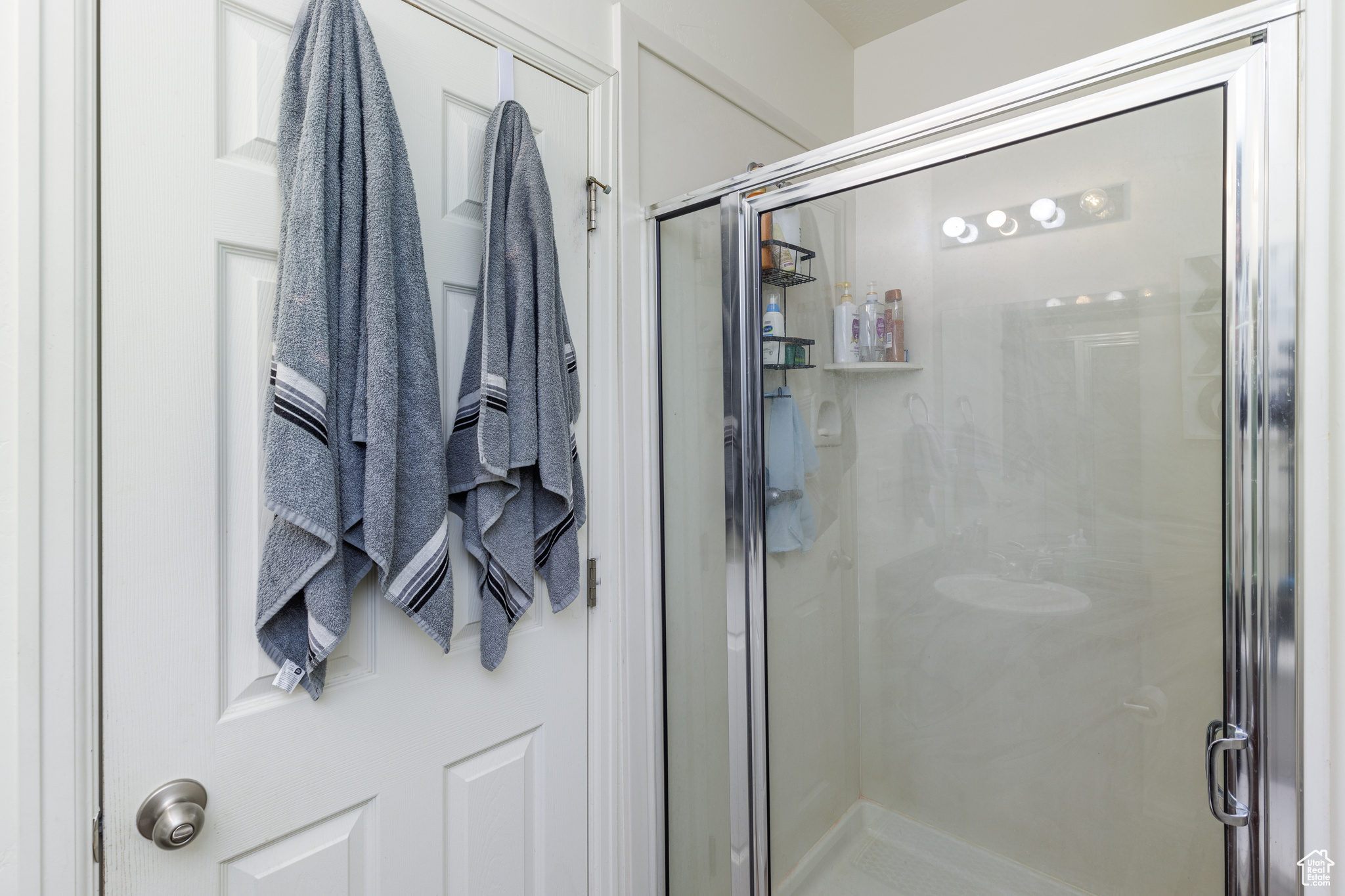 Bathroom with an enclosed shower