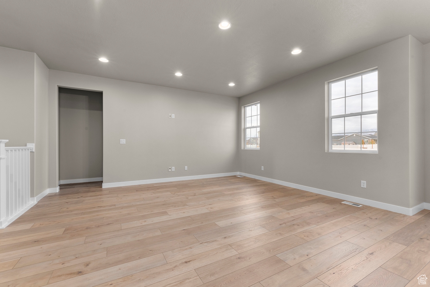 Spare room with light hardwood / wood-style floors