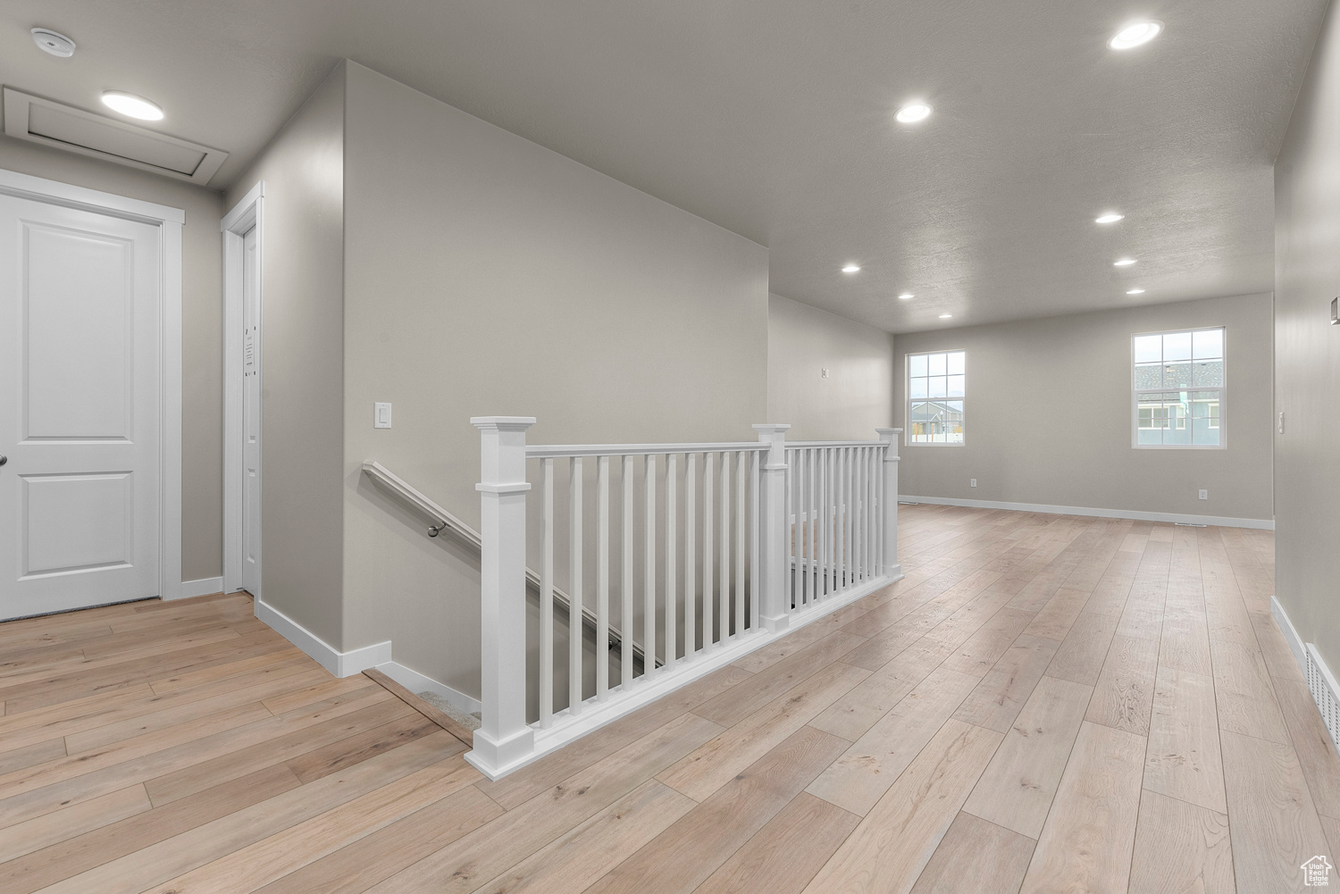 Hall featuring light hardwood / wood-style floors