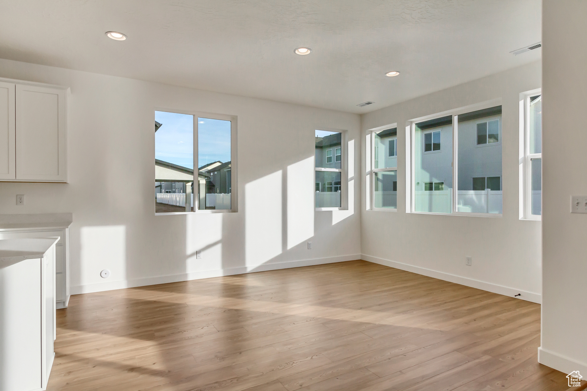 Unfurnished living room featuring light hardwood / wood-style flooring