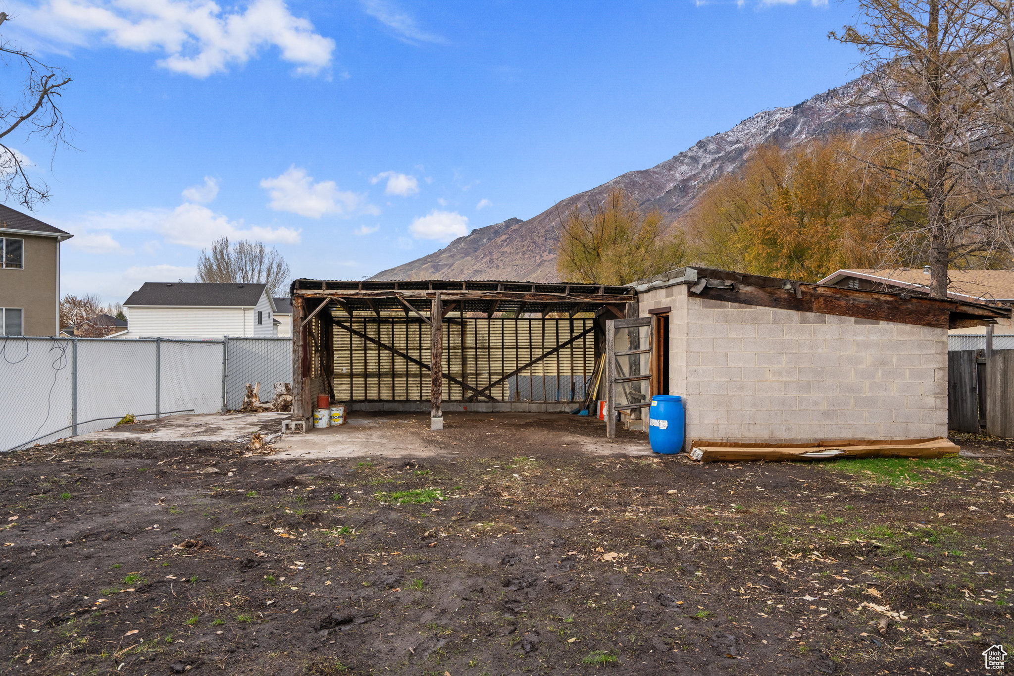 View of yard featuring a mountain view and an outdoor structure