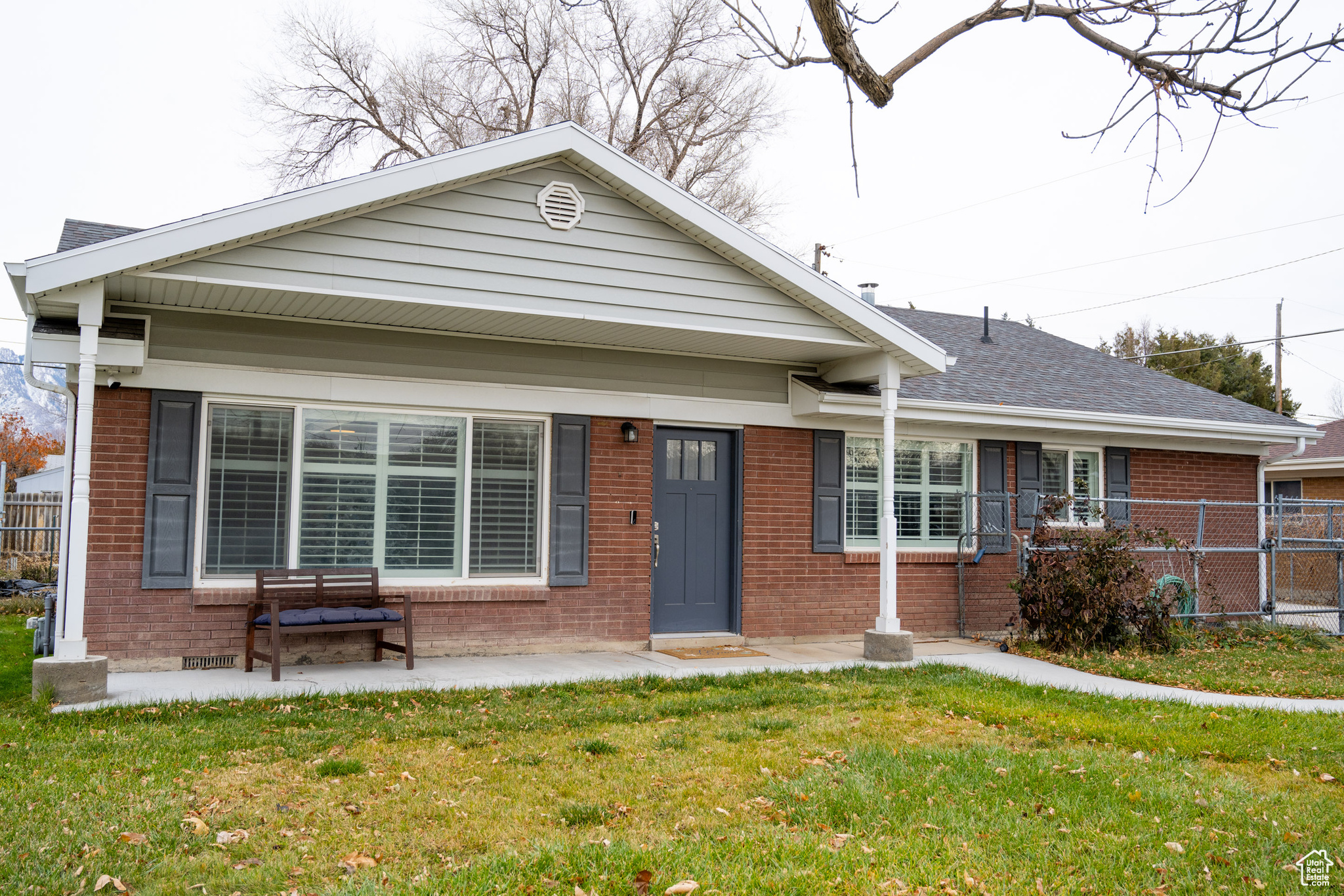 Bungalow-style home featuring a front yard