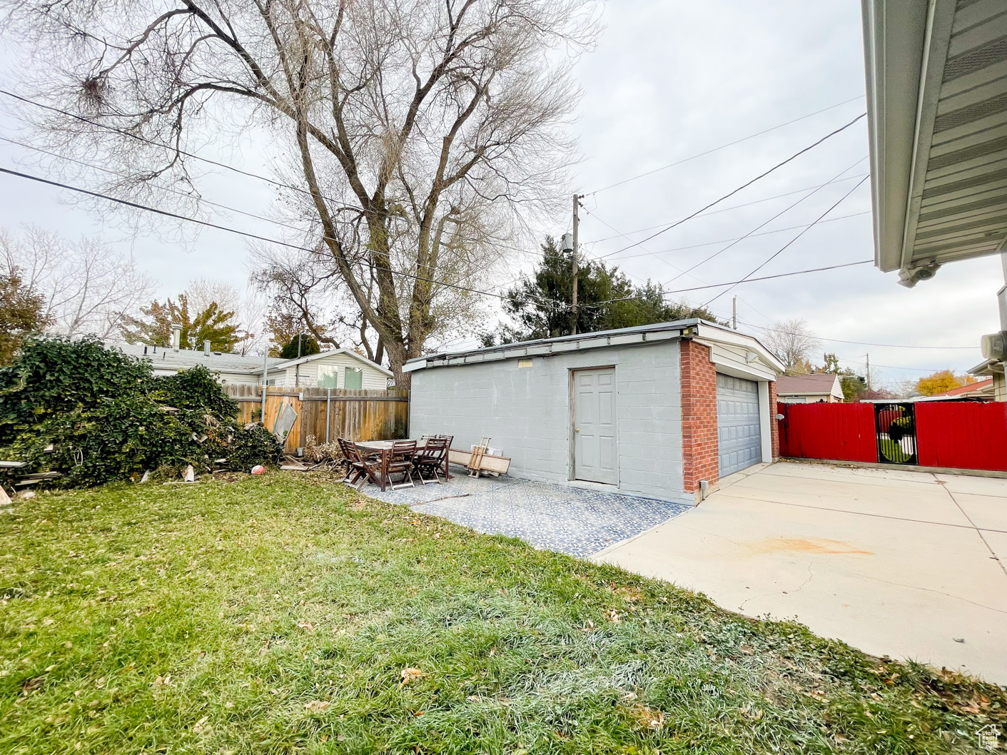 Garage featuring a yard