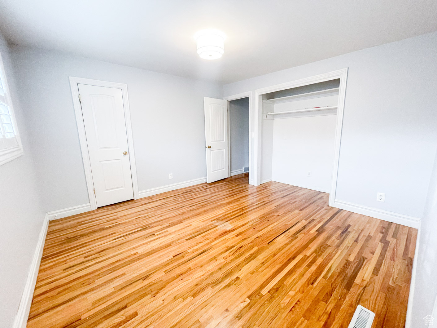 Main Bedroom.  Unfurnished bedroom with light wood-type flooring