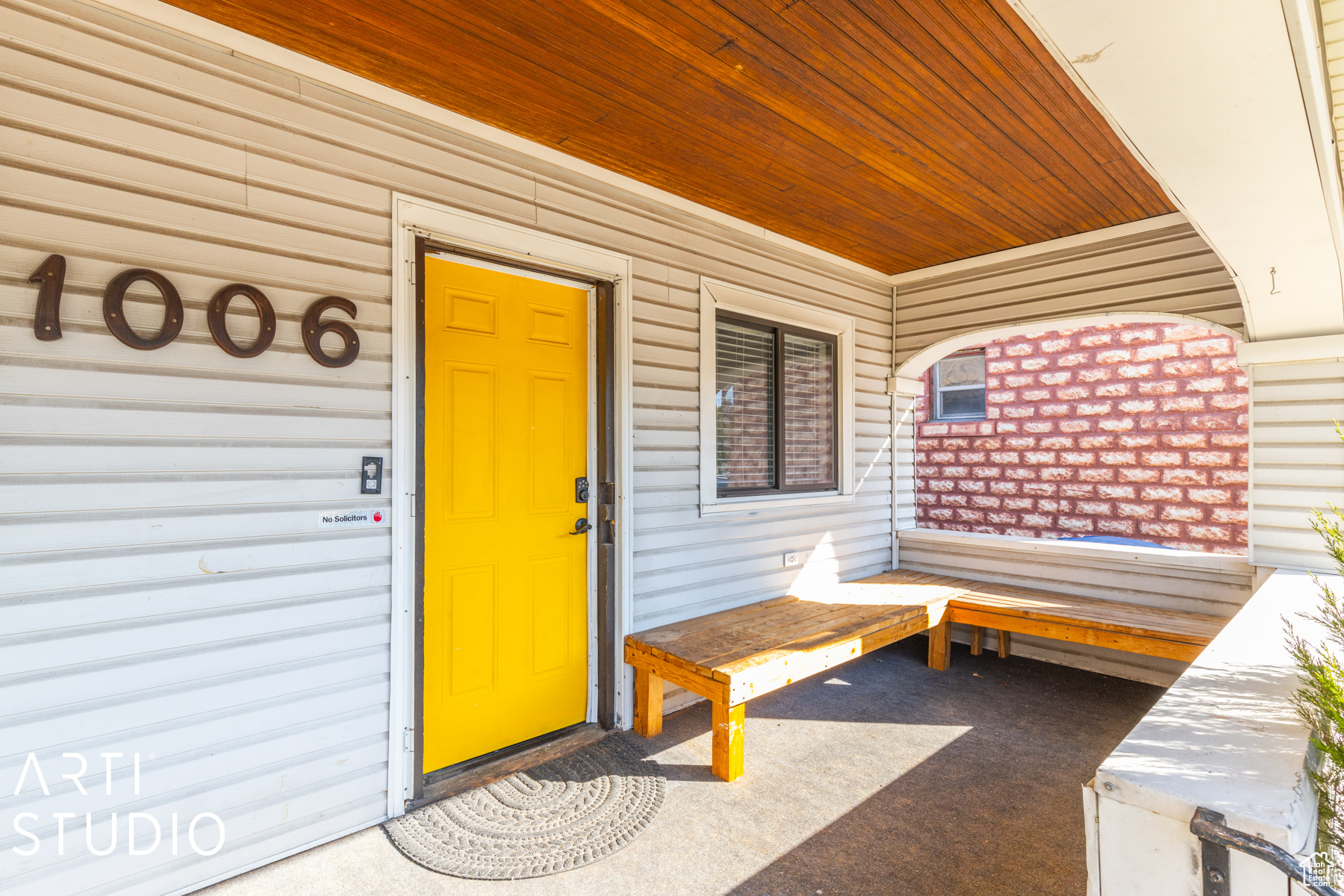 Property entrance with a porch