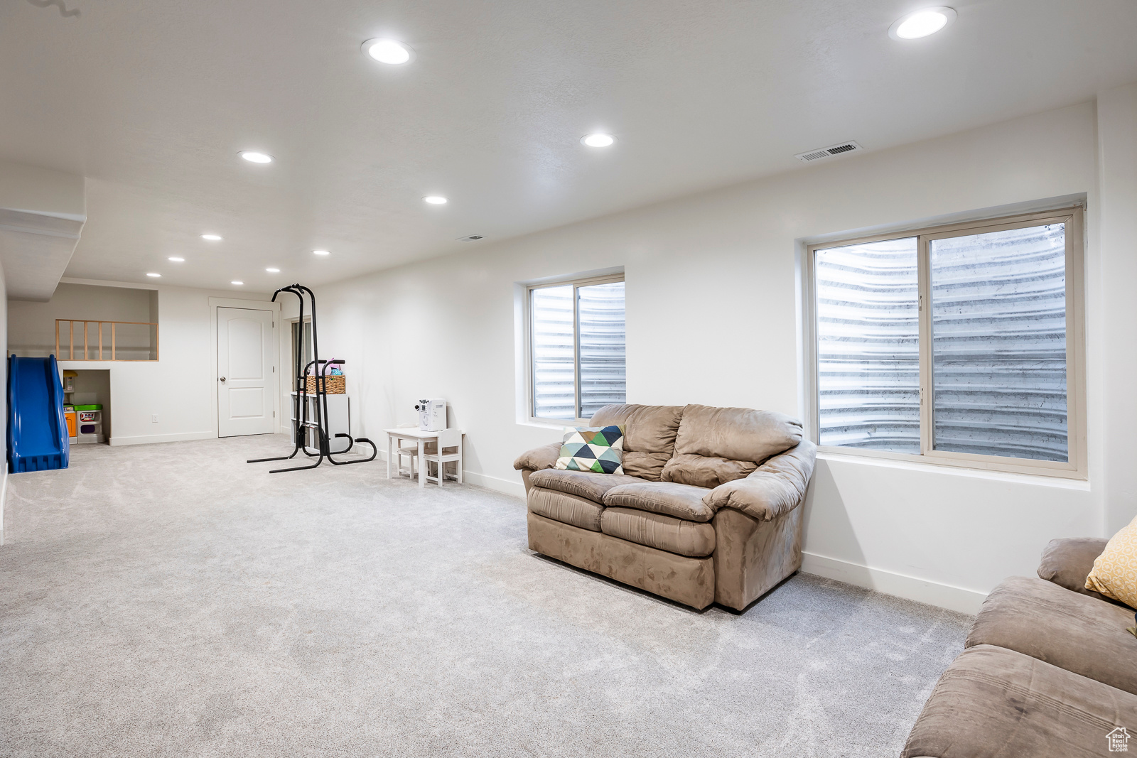 Living room with light colored carpet