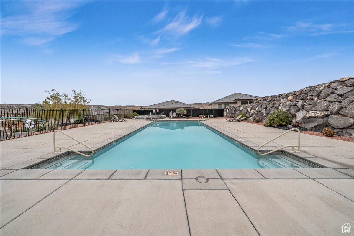 View of swimming pool featuring a patio area
