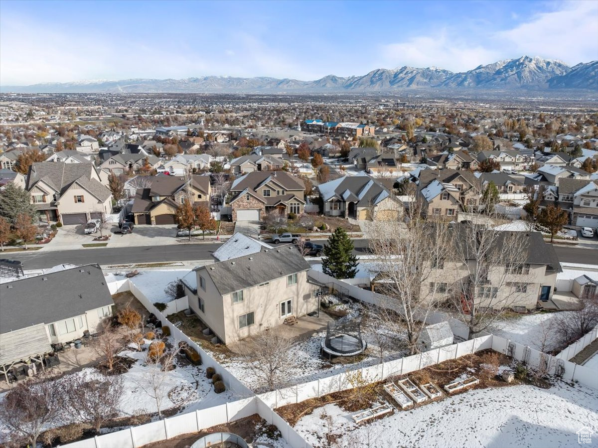 Snowy aerial view with a mountain view