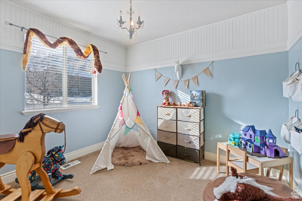 Playroom featuring carpet